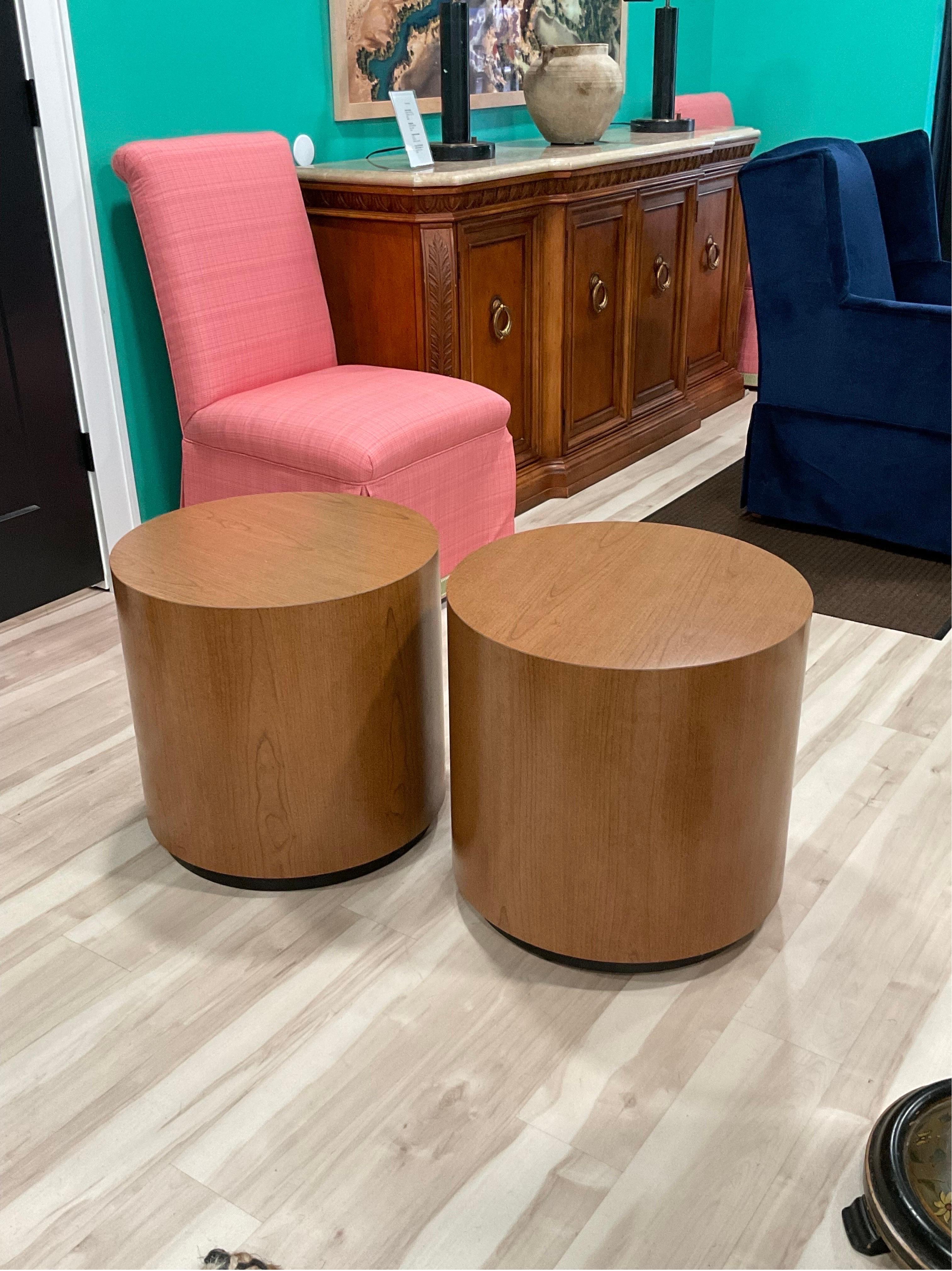 Pristine pair of wood grain laminate round side tables. Great look. Very very cool. Perfect size. Color is beautiful.


