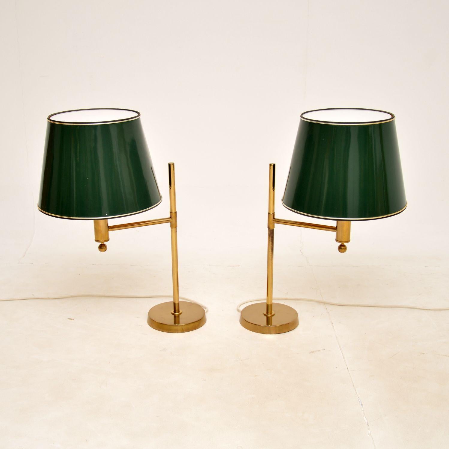 A fantastic pair of vintage table lamps, made in Sweden by Bergboms and dating from around the 1970-80’s.

They are a great size, very large and impressive for table lamps, the quality is outstanding. They have original green shades with removable