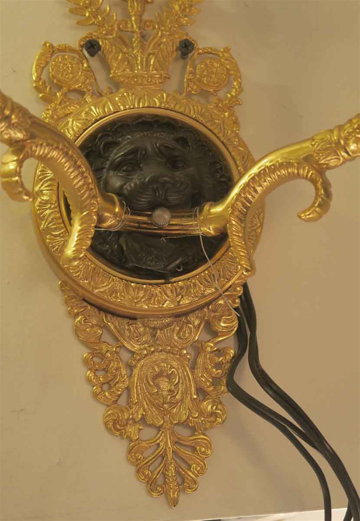 20th Century Pair of Waldorf Astoria Empire Gold Gilt and Black Lion Head Brass Sconces