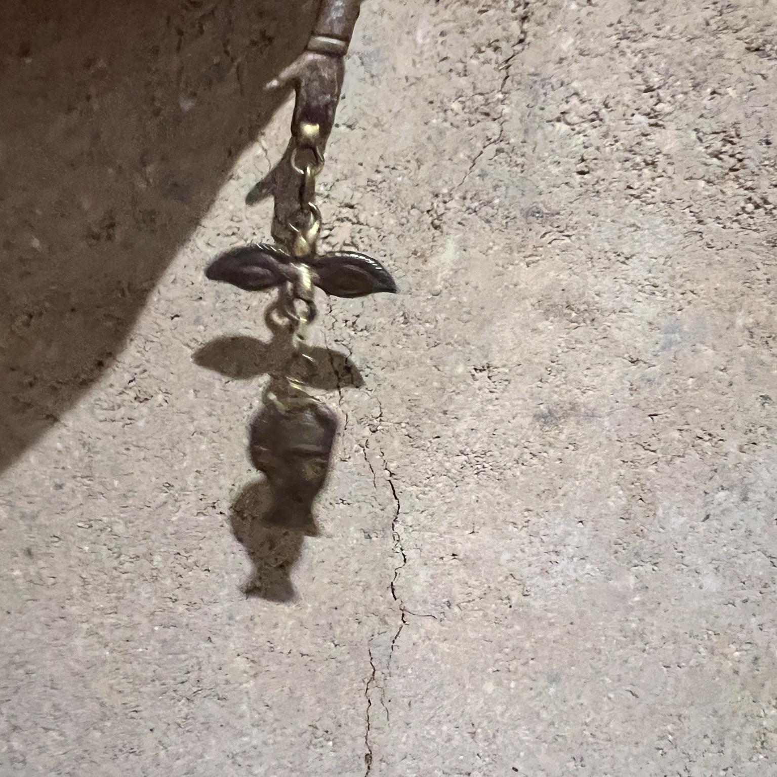 Mexican 1970s Pal Kepenyes Sculptural Brass Pendant Milagros For Sale