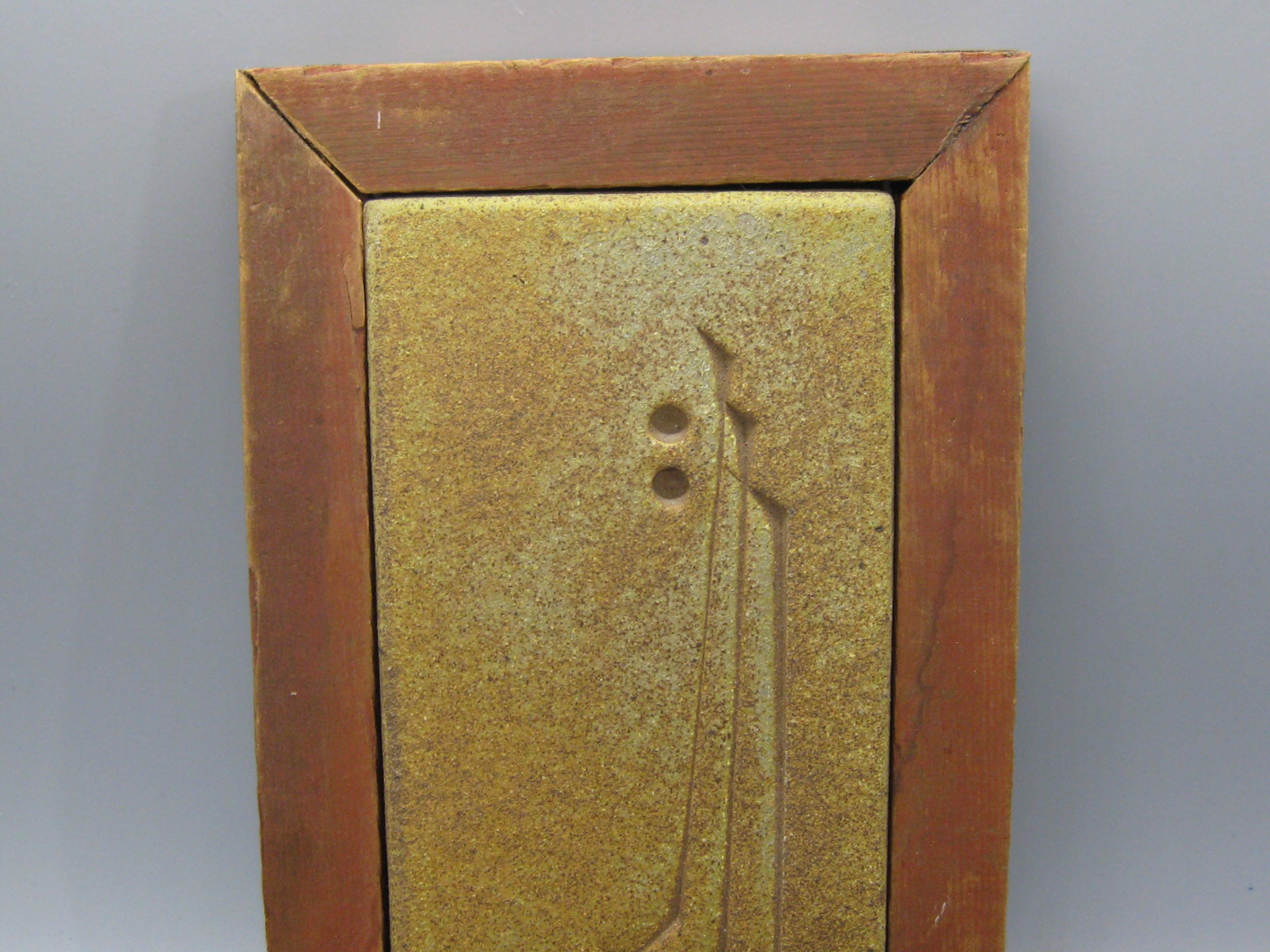 Wonderful vintage Paolo Soleri Arcosanti abstract ceramic/pottery framed tile wall plaque. The tile dates from the 1970s. It is in a wonderful woof frame that appears to be original to the piece. Marked in the lower corner 