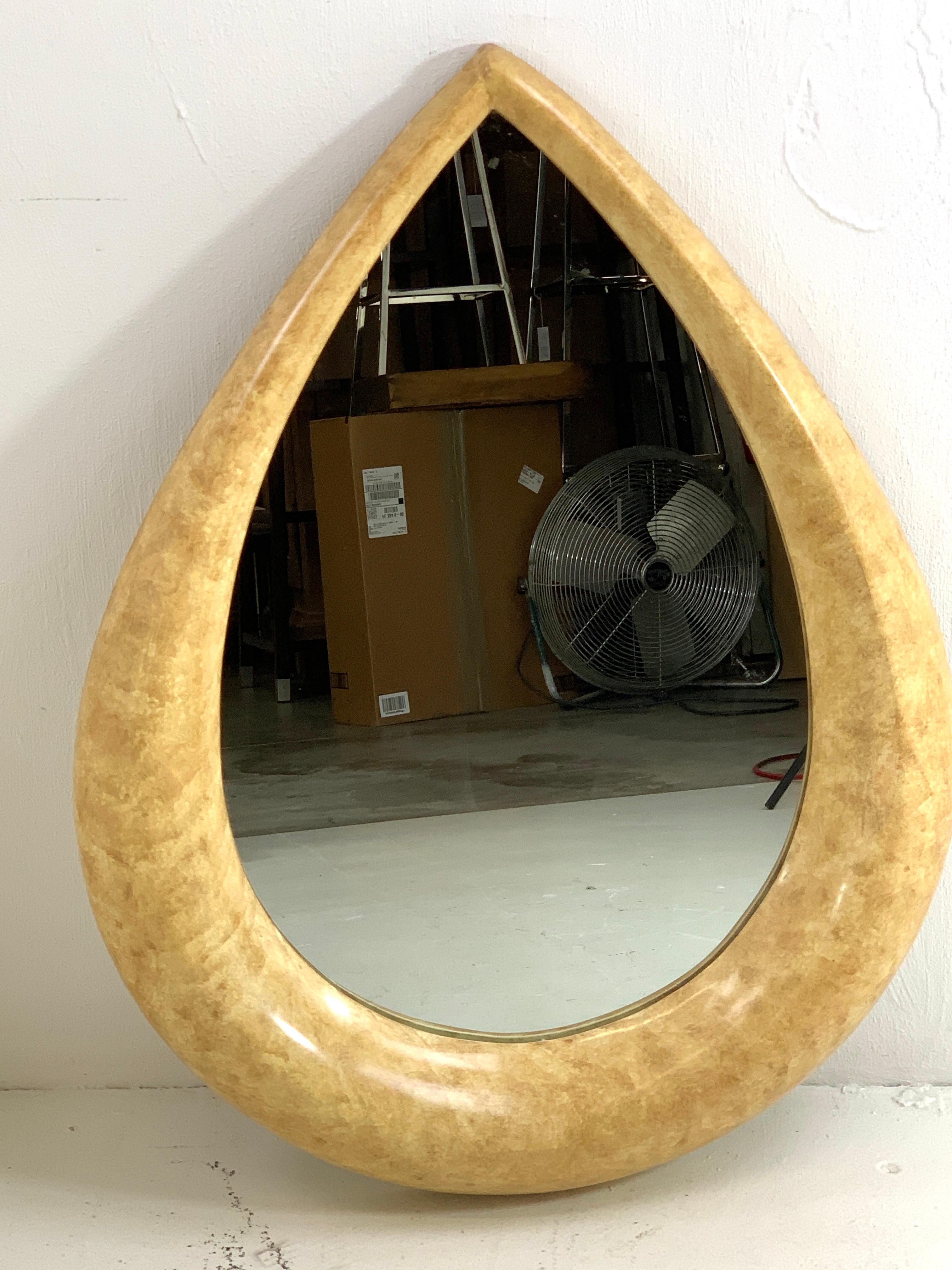 1970s parchment lacquered raindrop mirror, a sleek frame, lacquered to resemble parchment, with inset 32