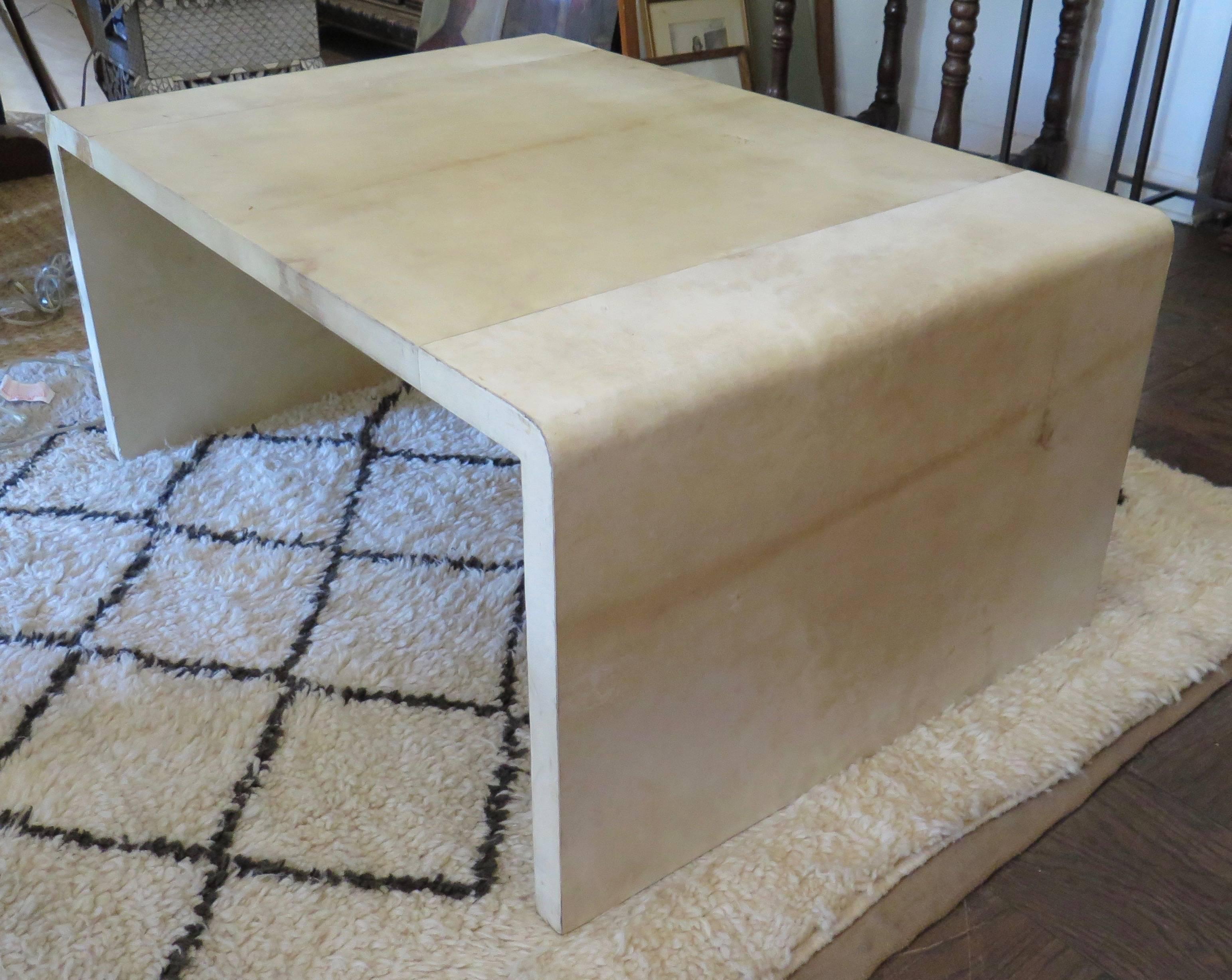 Great looking parchment coffee table in the style of Springer or Tura.