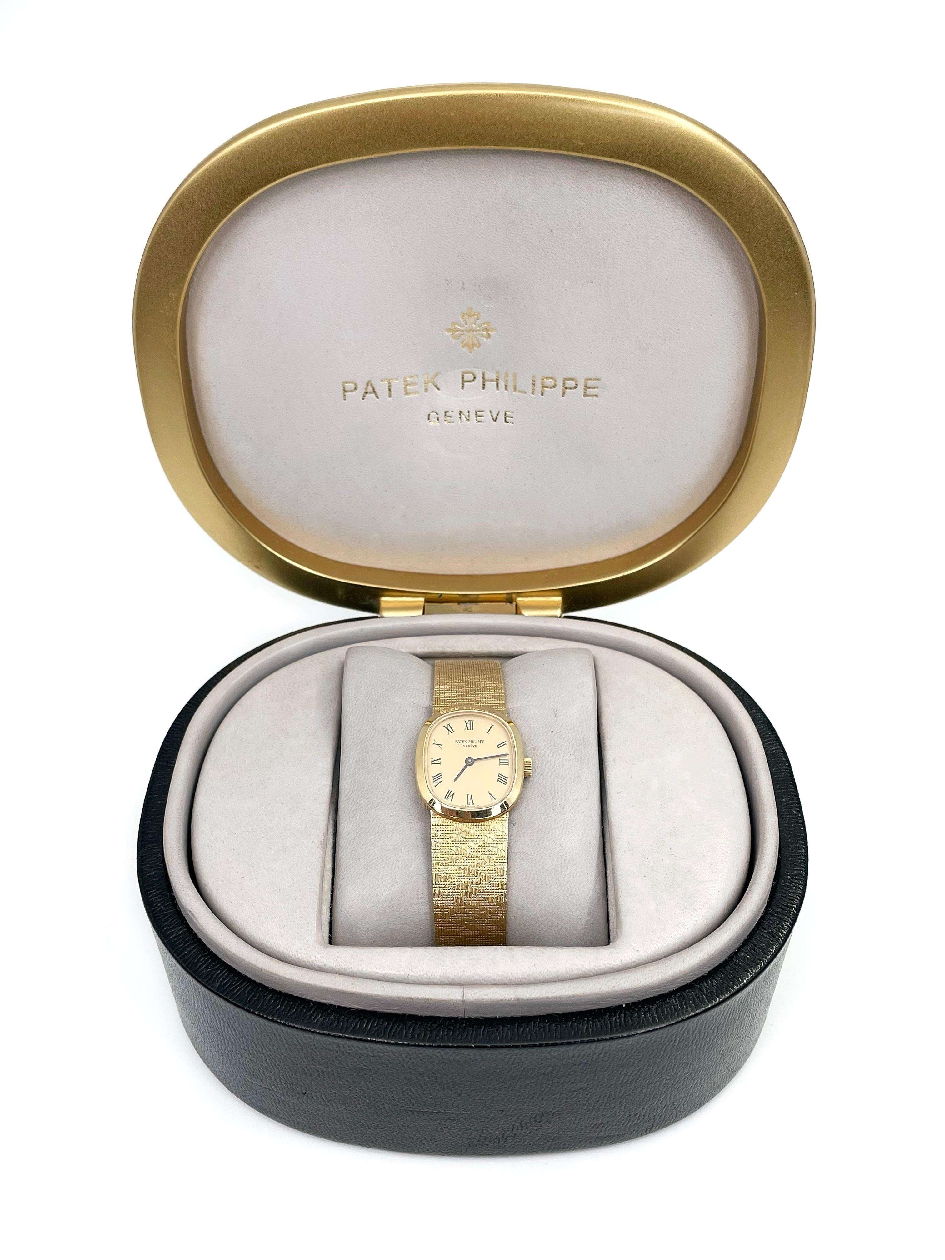 This is a luxurious vintage wrist watch designed by Patek Philippe in 1970s. The piece is crafted in 18K yellow gold. It is an elegant and iconic accessory. 

Reference no.: 4132/1
Year: 1970s
Movement: mechanical manually wound, no. 1272197
Calibre