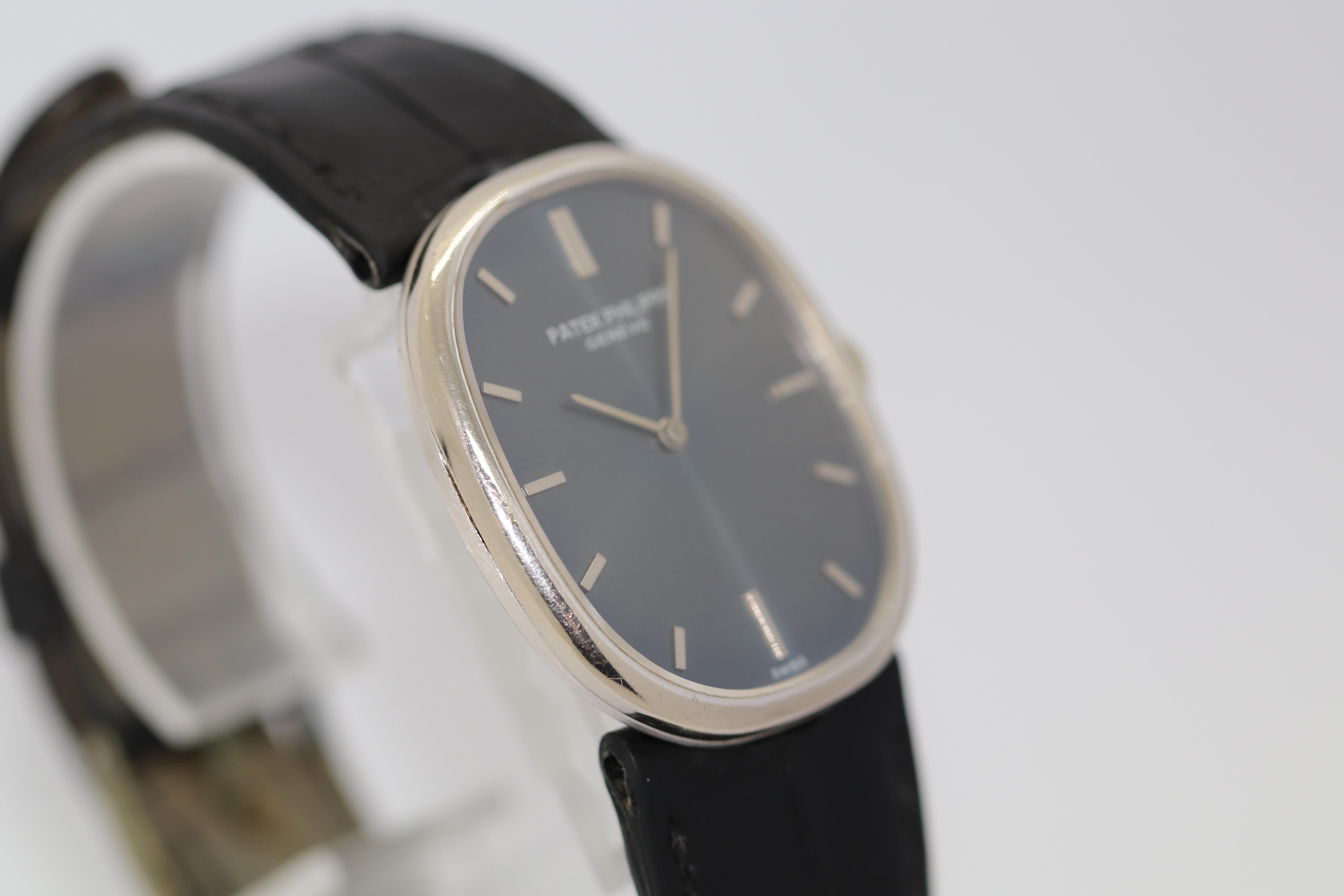 Women's or Men's 1970’s Patek Philippe Golden Ellipse d‘Or White Gold Blue Dial Ref. 3848 For Sale