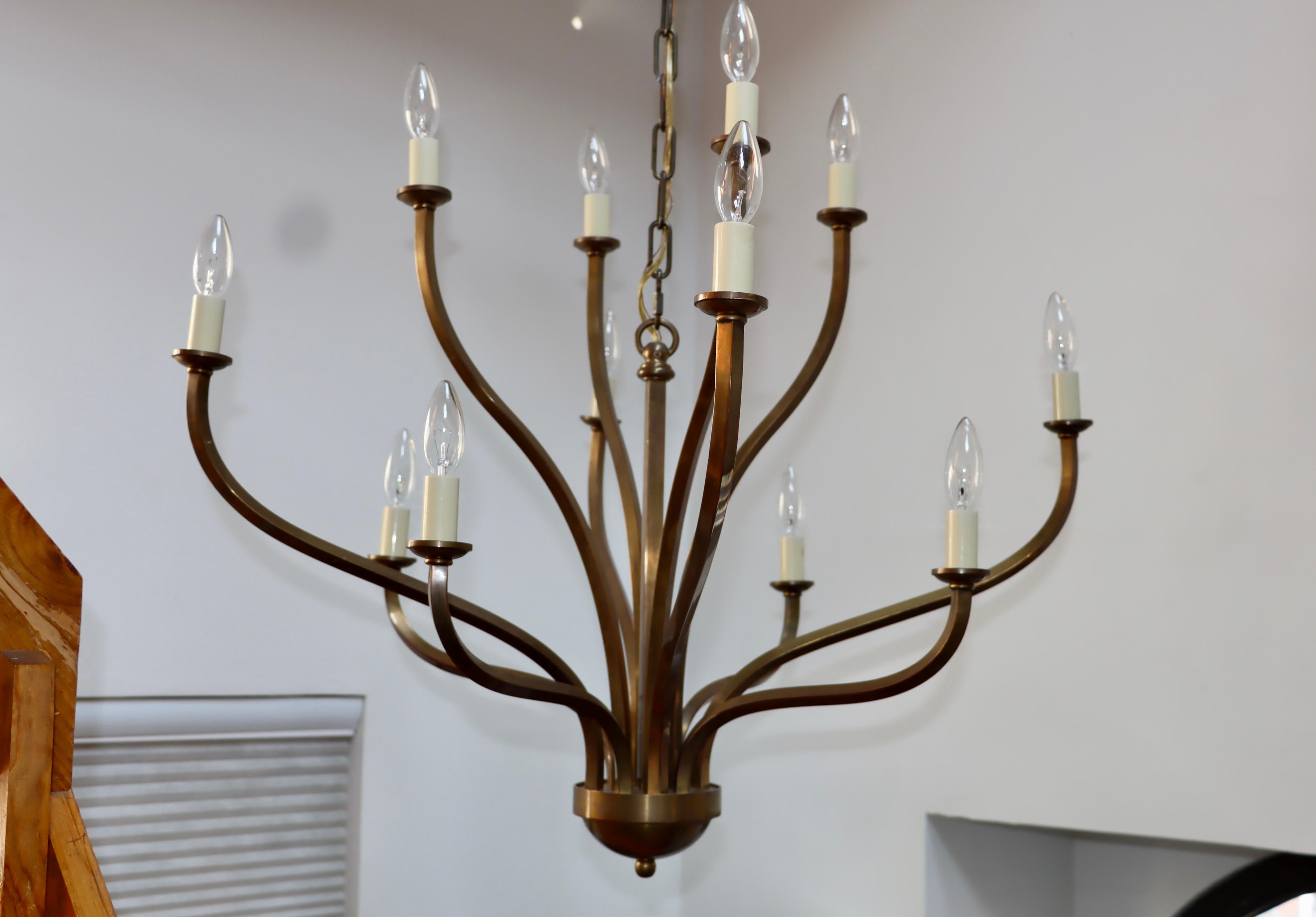 American 1970s Patinated Brass 12 Arm Chandelier Attributed to Hart Associates For Sale