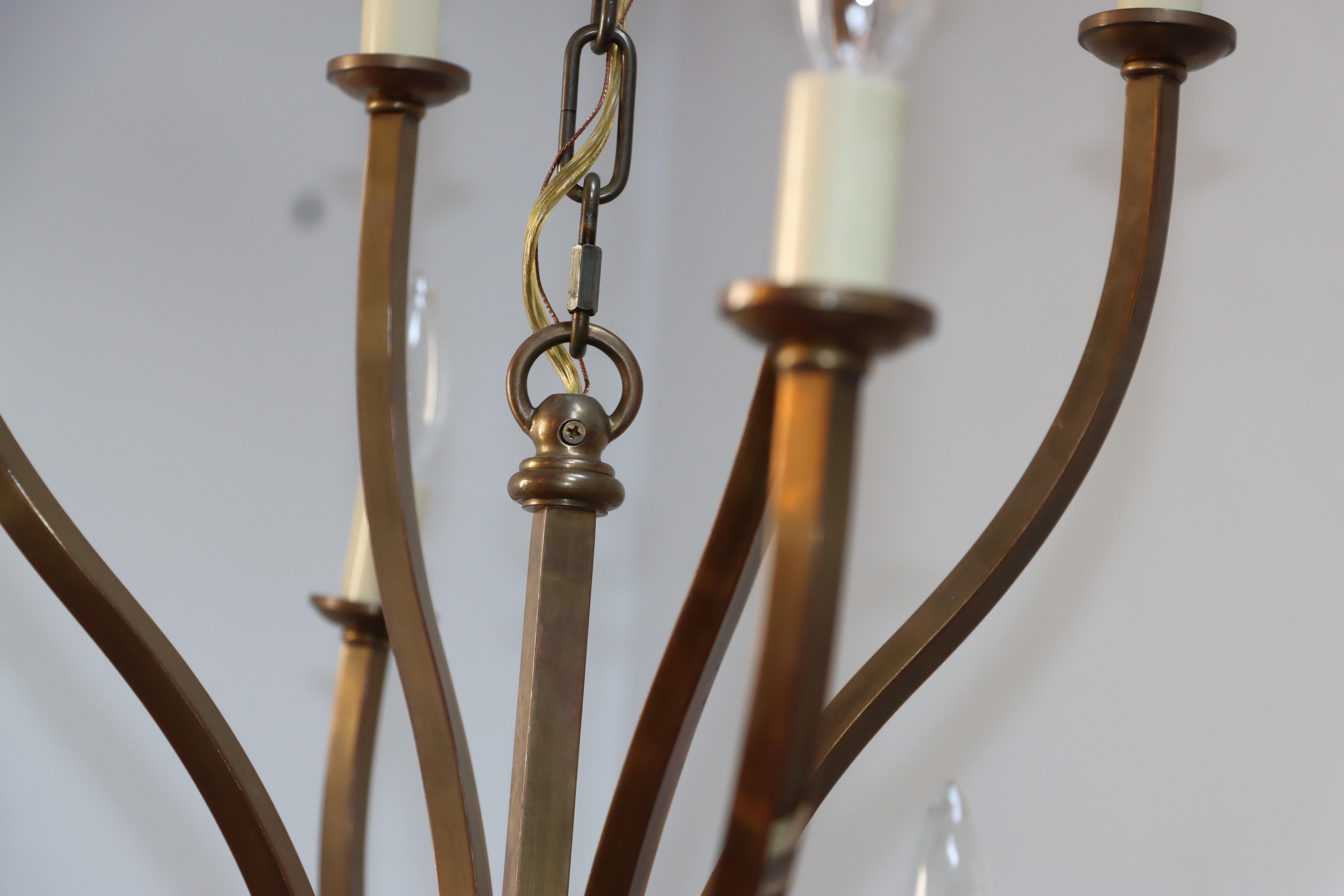 1970s Patinated Brass 12 Arm Chandelier Attributed to Hart Associates In Good Condition For Sale In New York, NY