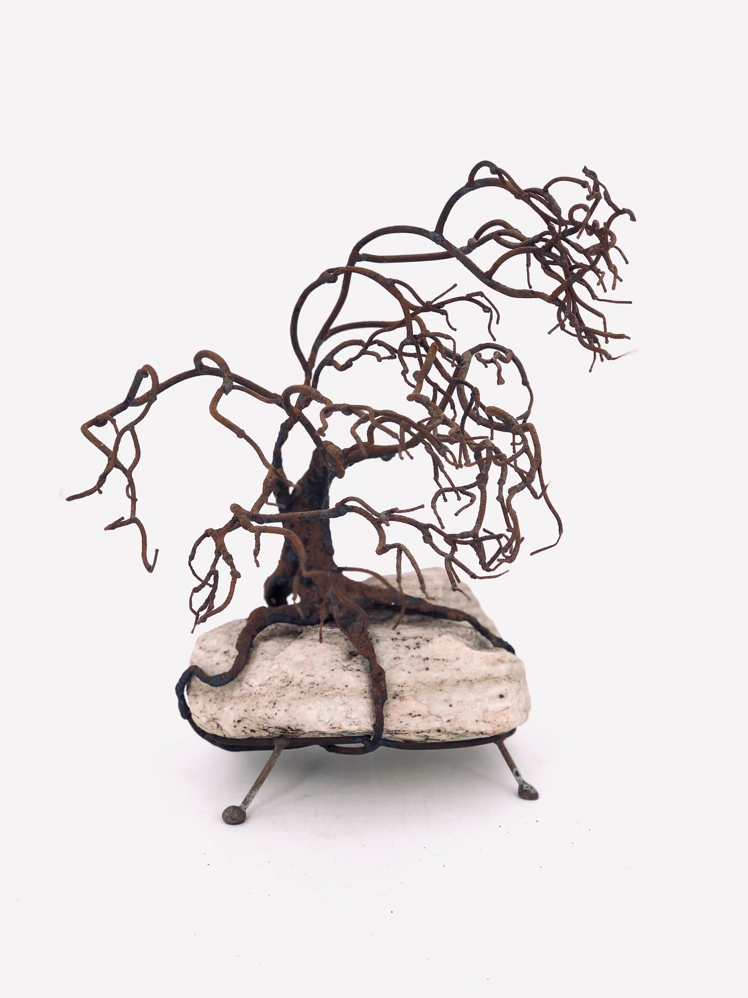 Beautiful abstract tree table sculpture, in patinated bronze sitting on a raw unpolished white stone base, nice and heavy unsigned.