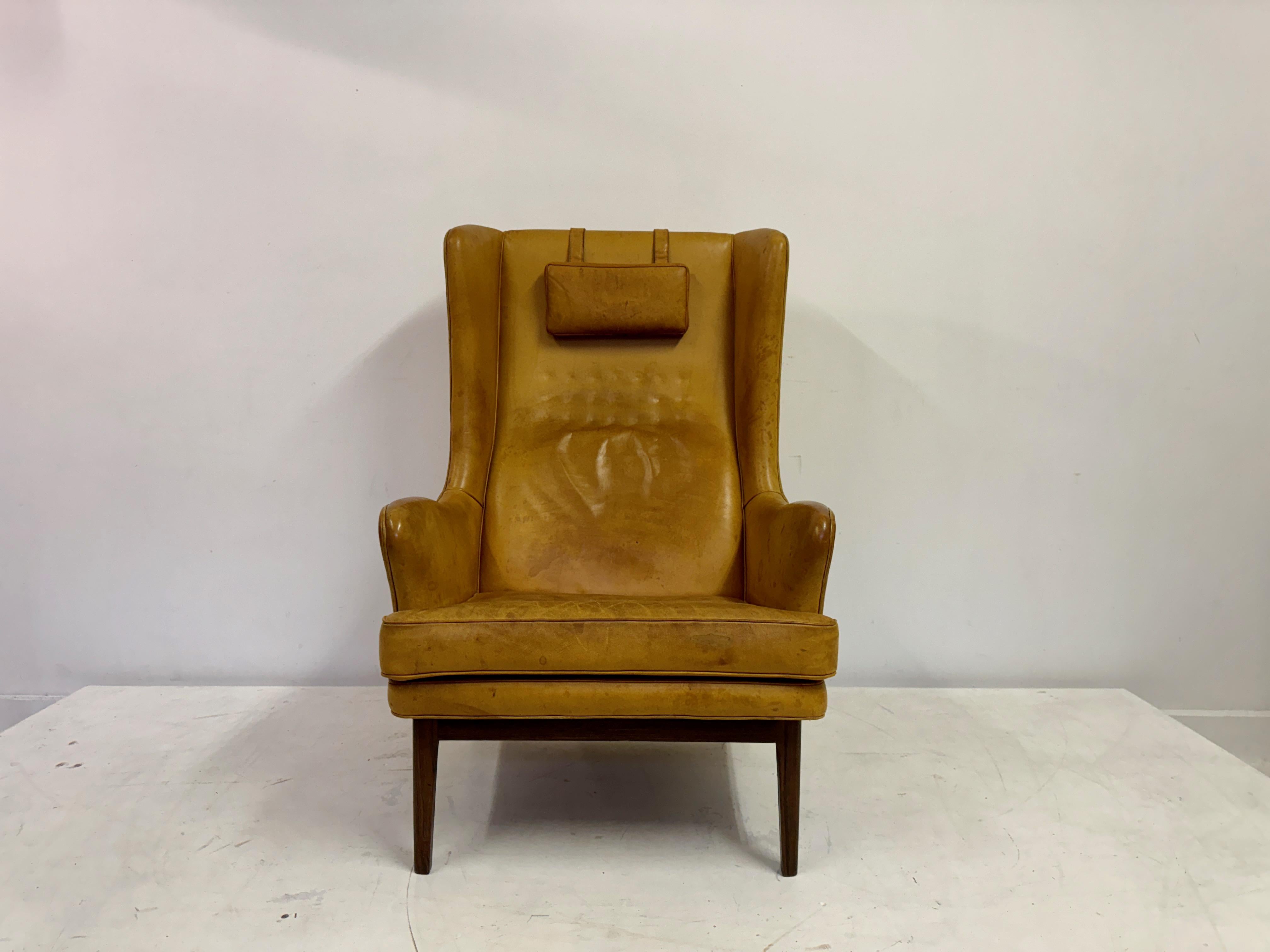 Mid-Century Modern 1970s Patinated Leather Wingback Krister Armchair by Arne Norell For Sale