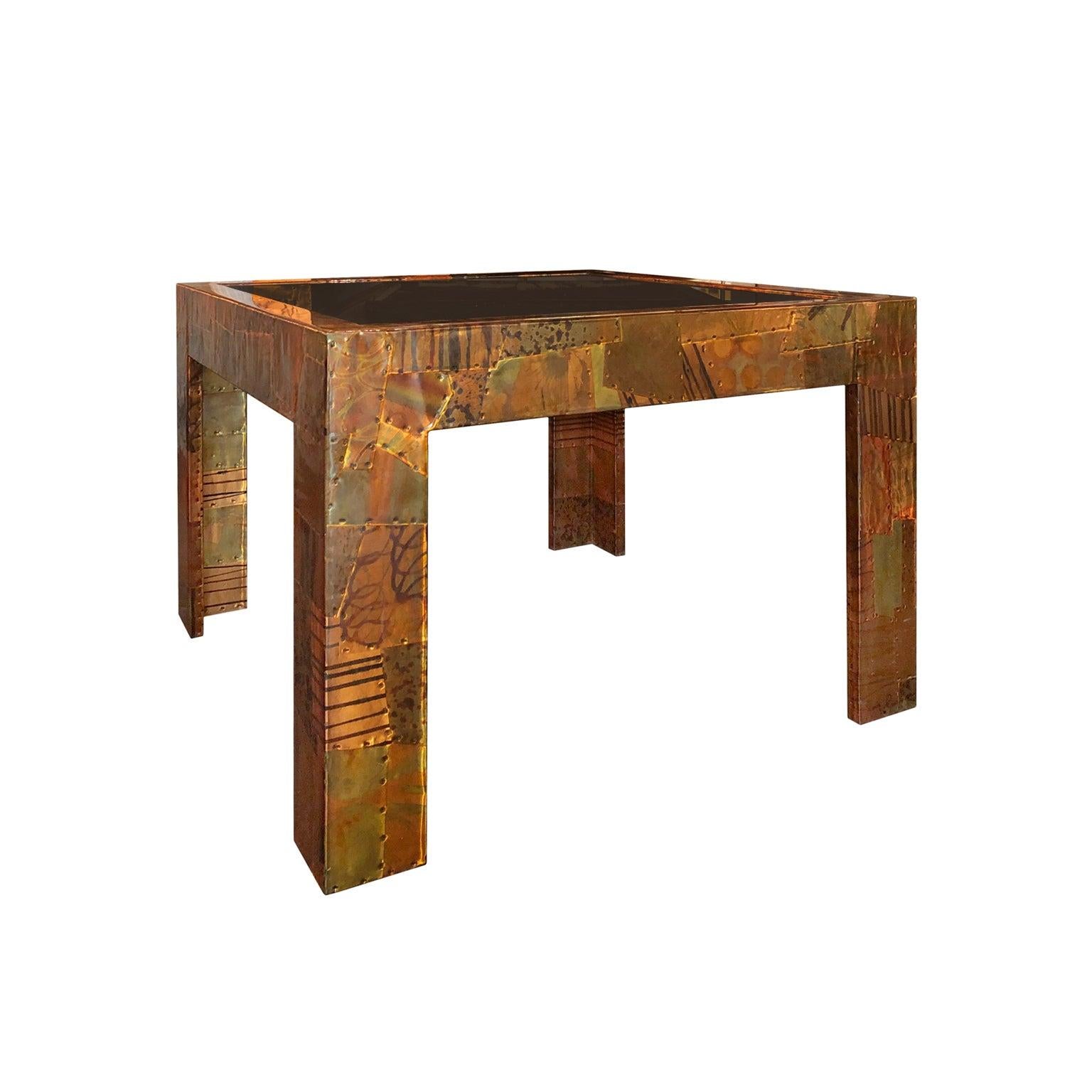 Paul Evans style patchwork metal cocktail table in copper, brass and pewter, USA, 1970s.
 