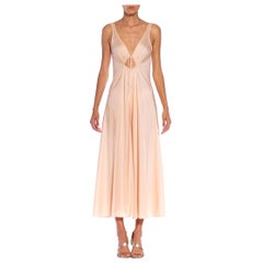 1970S Peach Poly Blend Jersey Jumpsuit With A Cut Out Front