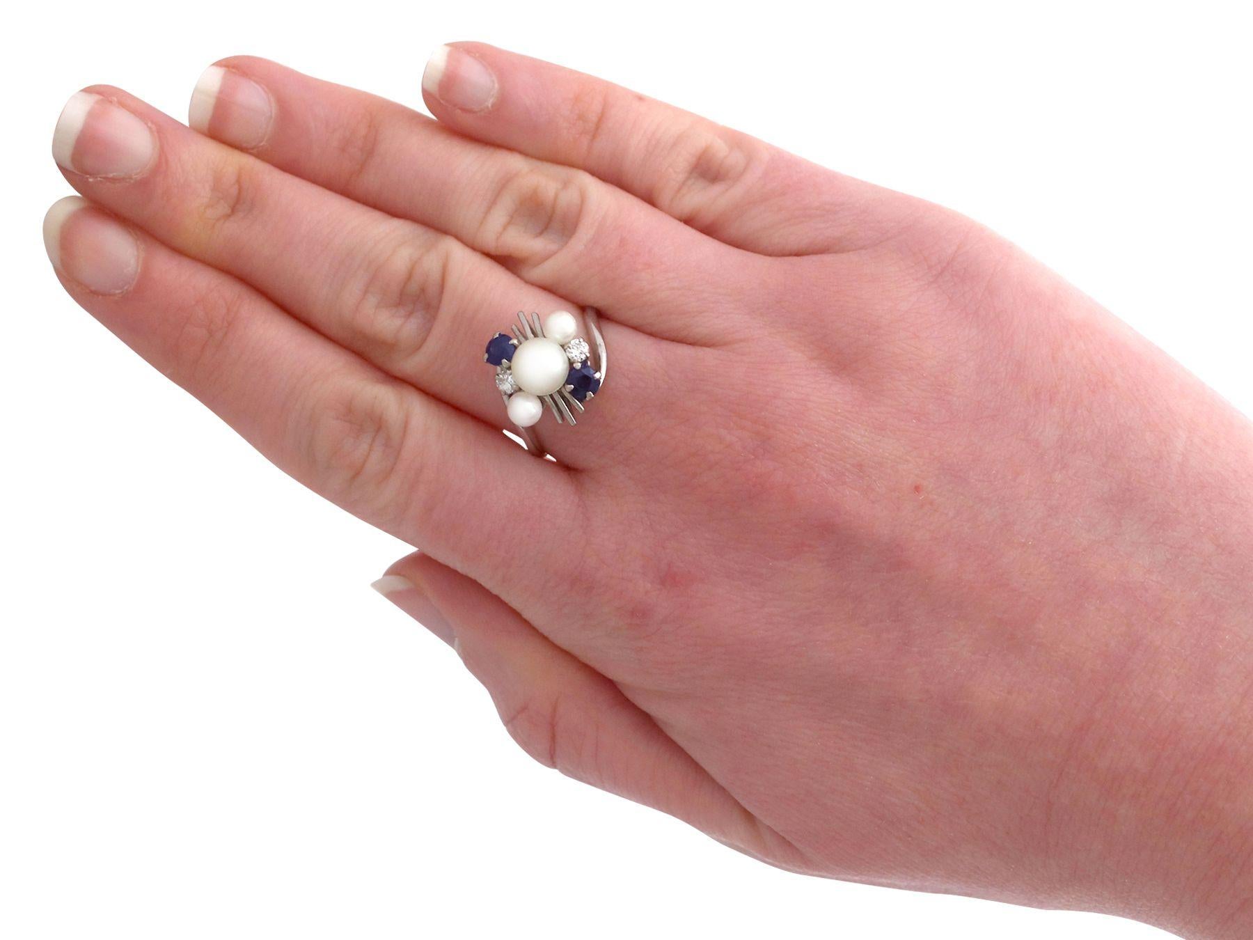 Round Cut 1970s, Pearl and Sapphire Diamond and White Gold Twist Ring For Sale