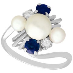 1970s Pearl and Sapphire Diamond and White Gold Twist Ring