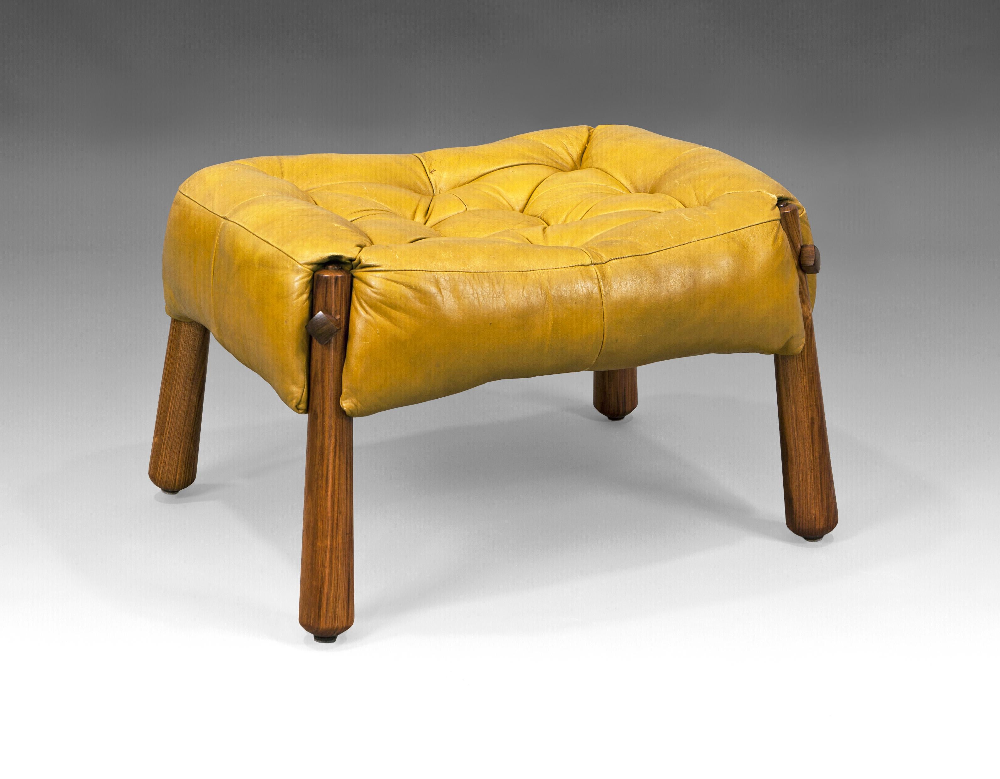 Rosewood tapered legs and yellow leather ottoman/footstool designed by Brazilian Architect Percival Lafer. Brazil, 1970s. 
Percival Lafer is considered one of Brazilian Modernism Pioneers. Attracted to engineering and mechanisms, he studied