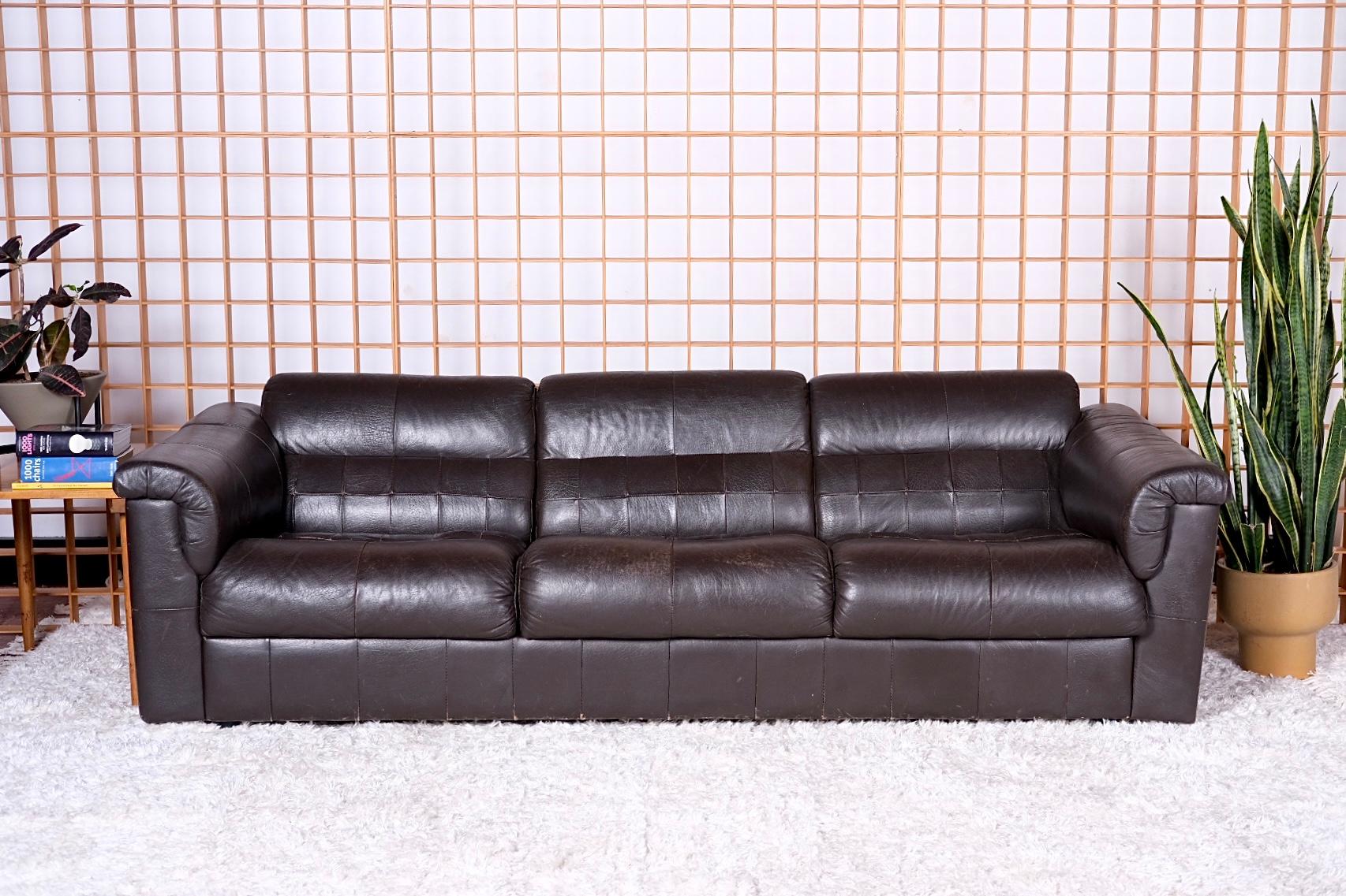 This Percival Lafer Sofa in Dark Chocolate Leather was originally purchased in Brazil and later imported into the U.S. Like many of Lafers designs it is lightweight with supple leather and rosewood feet. The sofa has original tags showing October