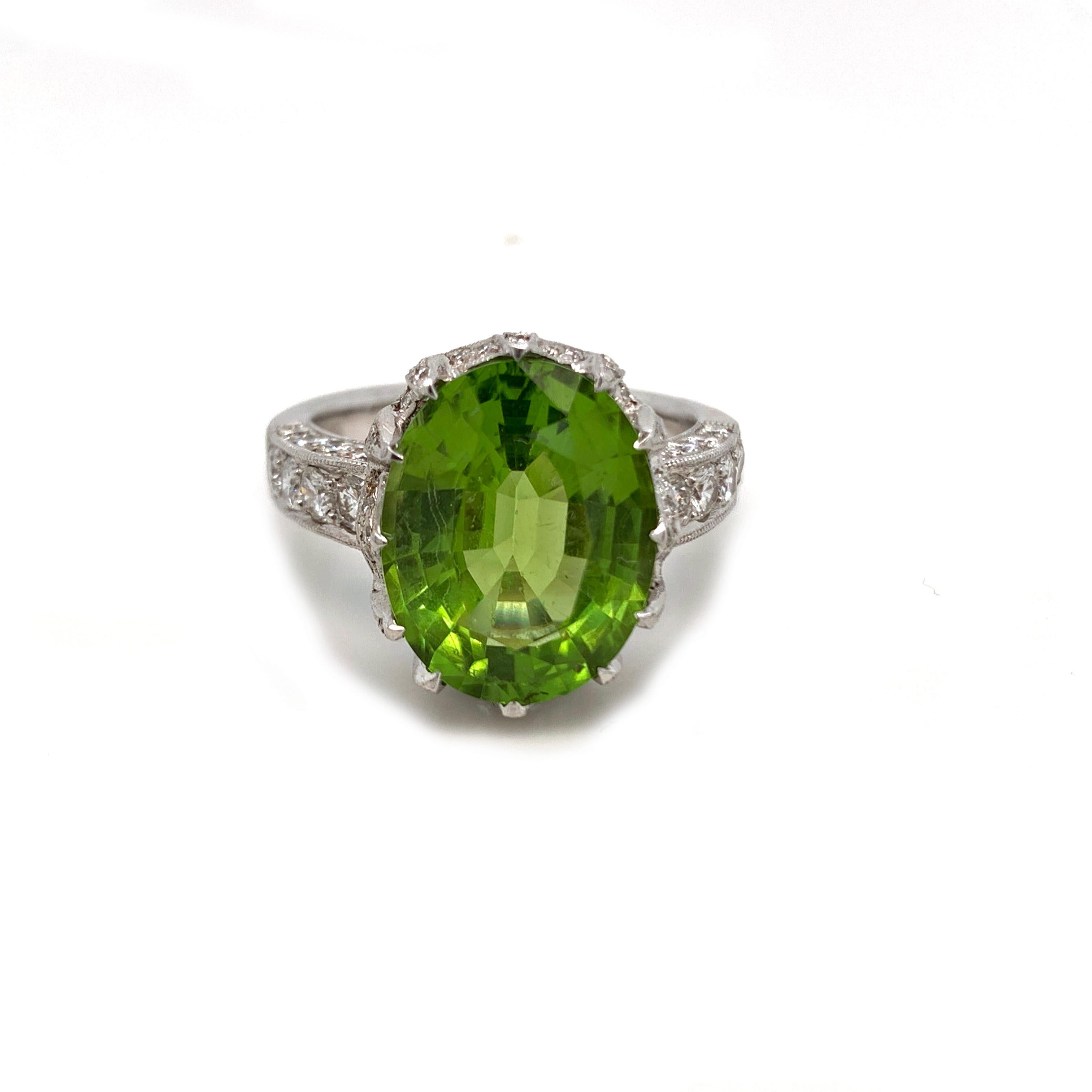 From, the 1970's this beautiful 18kt white gold peridot and diamond ring. This beautiful ring is a US ring size 7.75 and weighs 9.6grams. The, ring is beautiful and feature an approx 6ct peridot. In, excellent codition for a a piece made in the