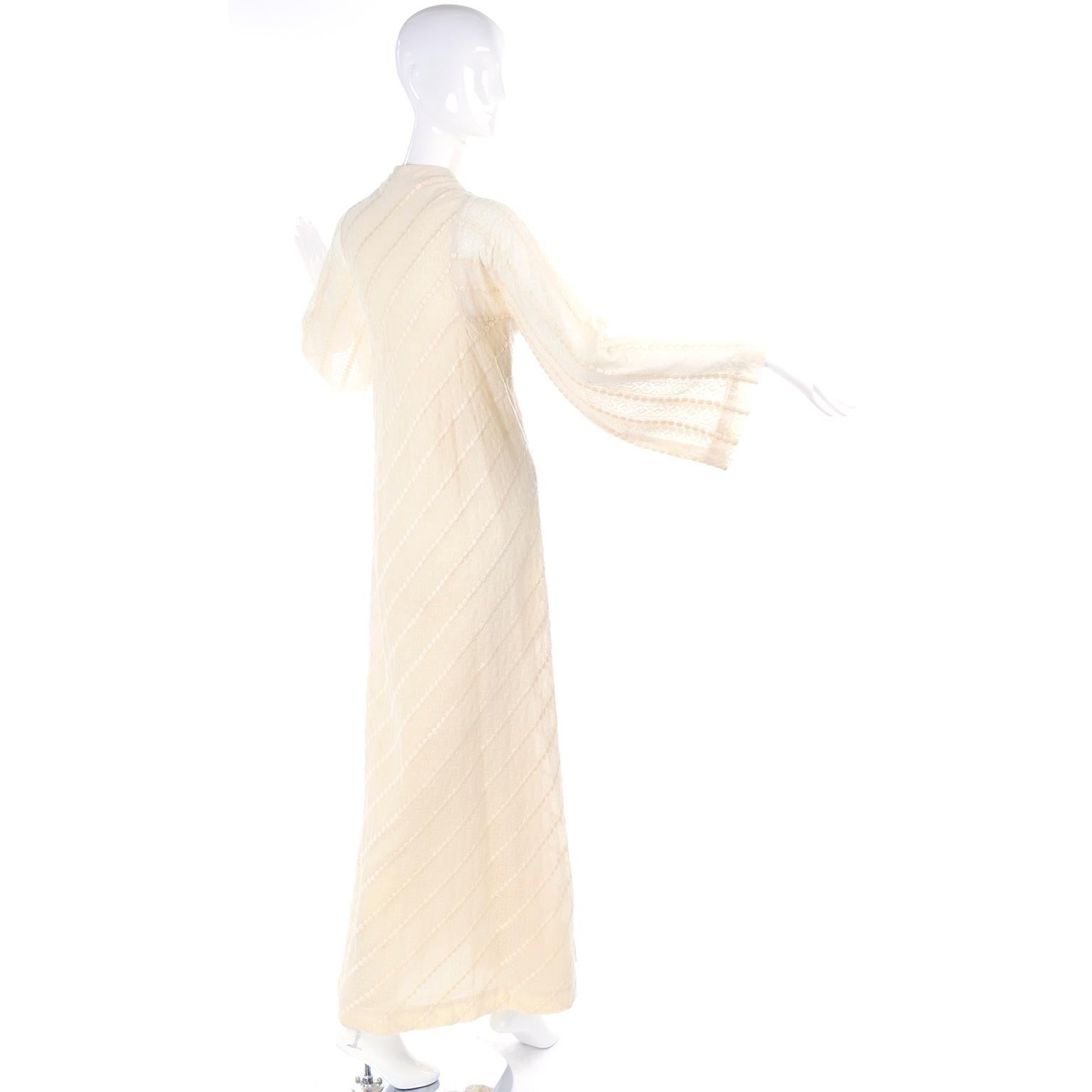 1970s Phyllis Sues Vintage Cream Dot Embroidered Cotton Wrap Dress W Tassels In Excellent Condition In Portland, OR