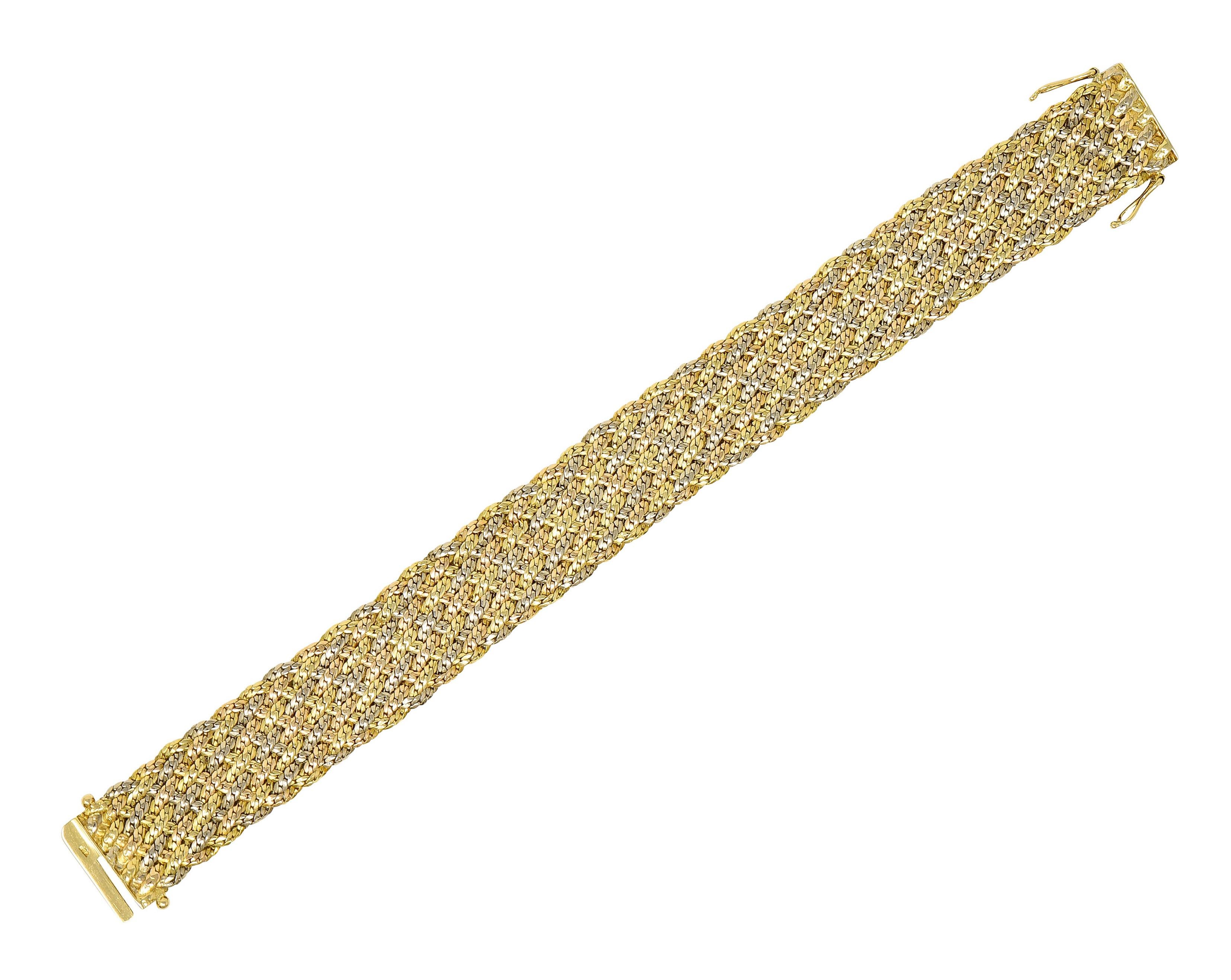 Rose, yellow, and white gold chain is woven together as a wide bracelet

Very malleable and completing as polished gold terminals

Functioning as a concealed slide clasp with two figure eight safeties

Emblazoned Piaget and stamped 750 for 18 karat