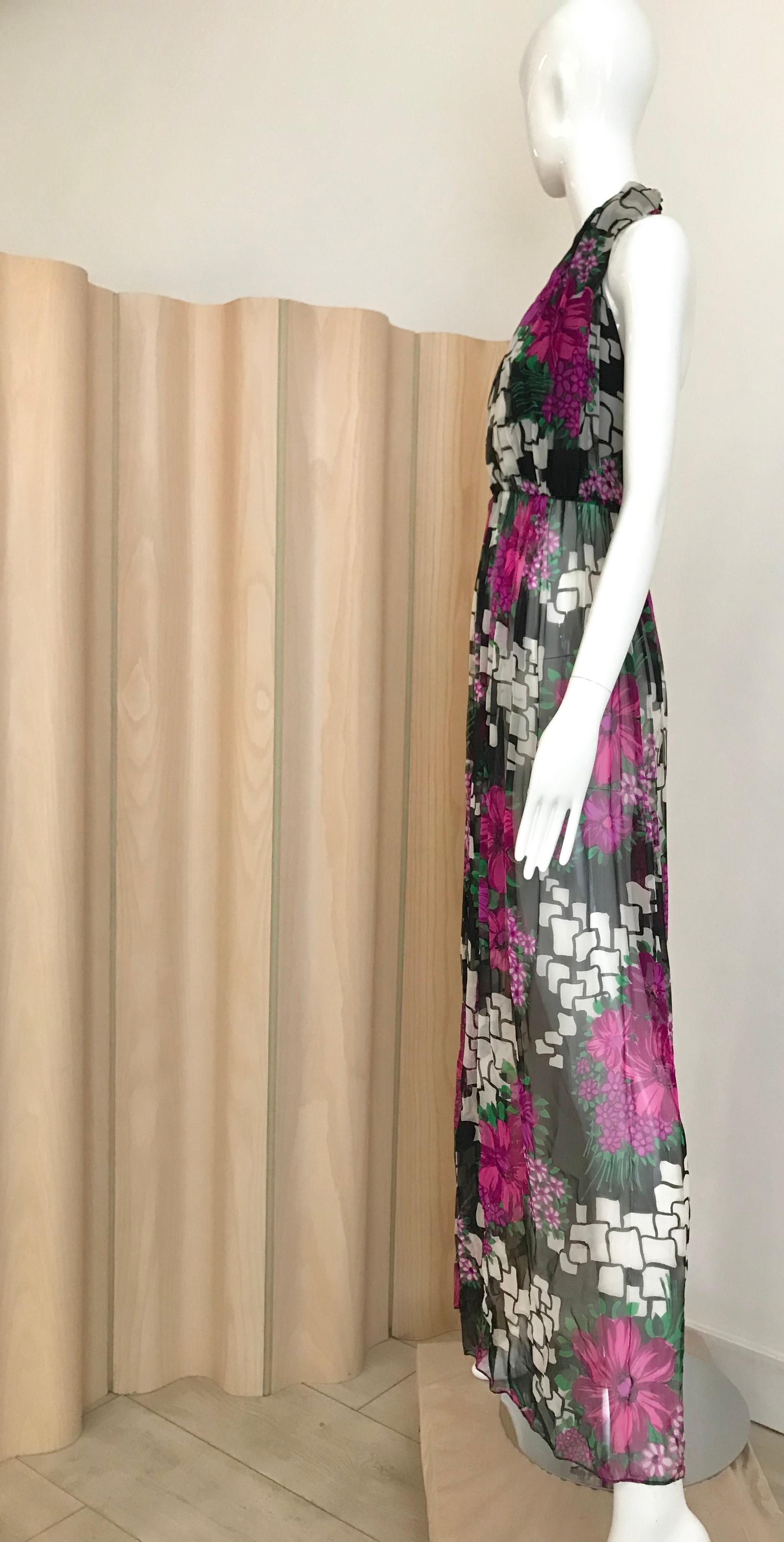 Beautiful 70s Pierre Cardin Silk Floral Print Halter Vest dress. 
Fit XS/ size 0 or 2 