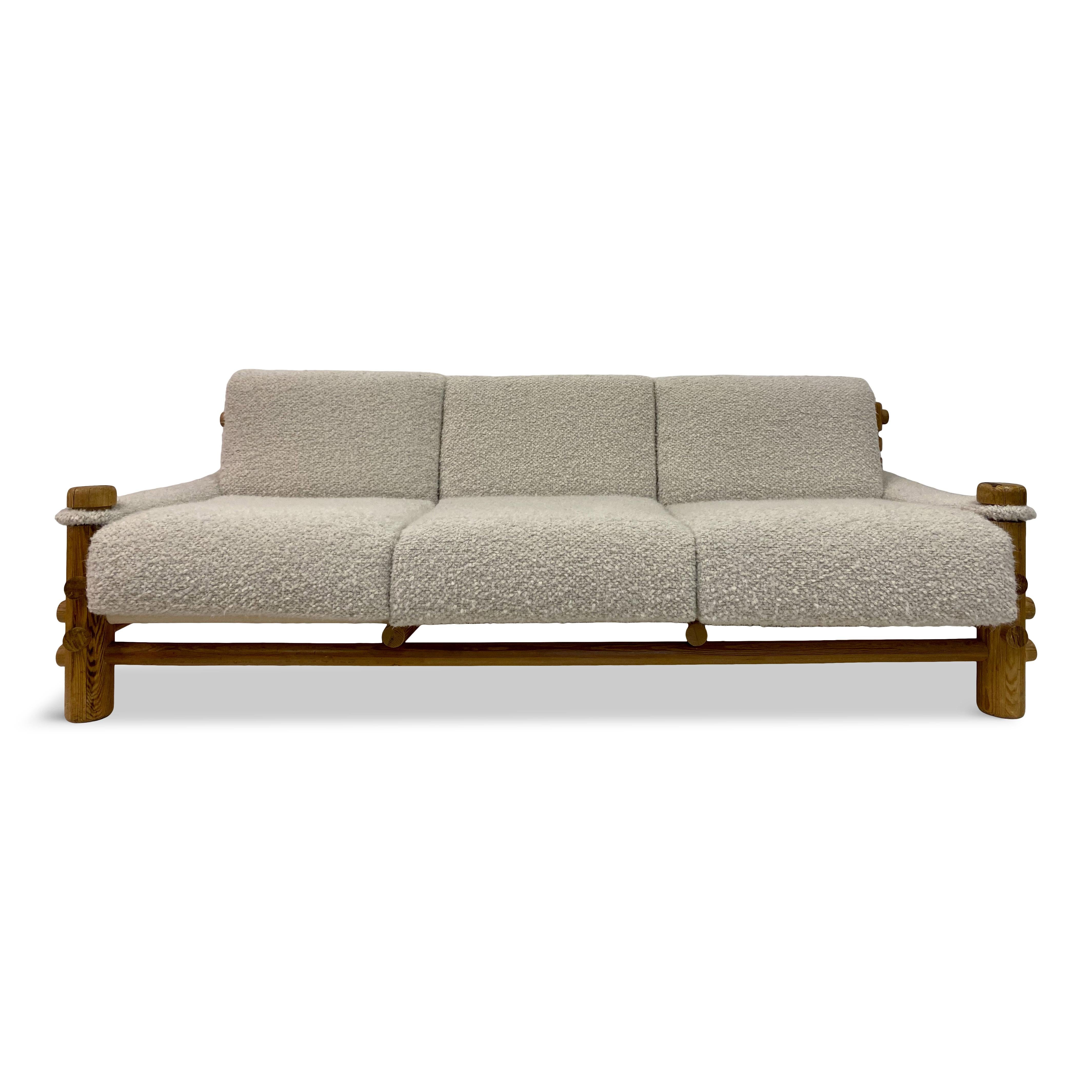 Alpine style sofa

Chunky cylindrical pine

New chunky two tone boucle weave

Woven with a textural fluffy yarn so very soft and tactile

Designers Guild fabric

Canvas seat and back supports

1970s.


 