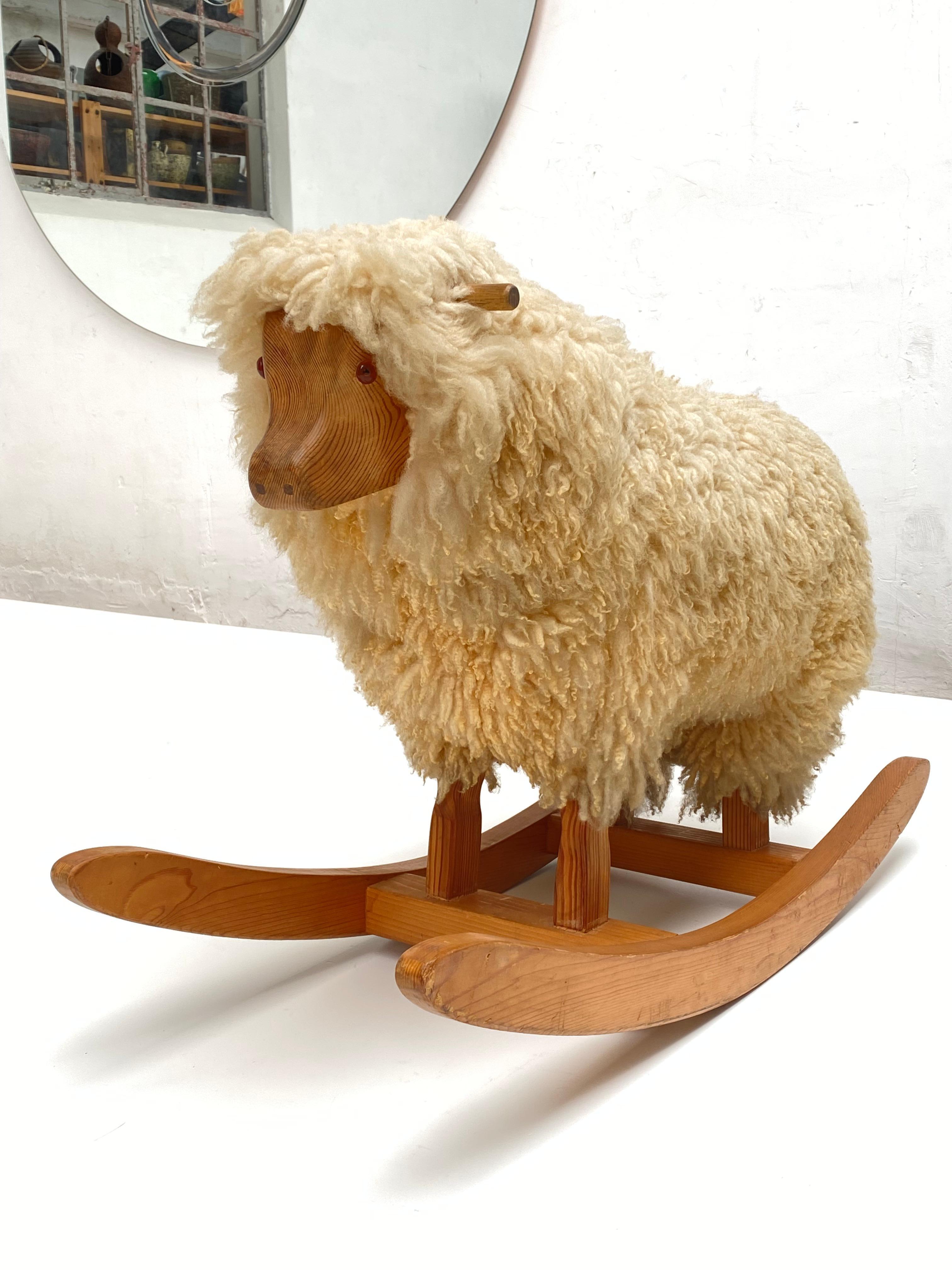1970's Mid-Century Modern Rocking Sheep 

Made and distributed in The Netherlands by Texeler Wool

The company had these sheep made to sell them to resellers as a promotional piece in their shops 

Carved solid Pine wood and genuine Sheep Wool