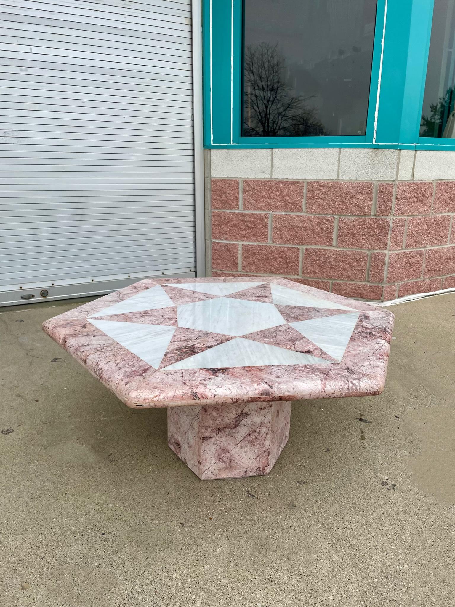 The prettiest vintage table does exist… this postmodern beauty takes center stage in our shop there’s nothing not to love. Set with a hexagon base and top slab shape. Features a star pattern that looks quilt inspired. The marble details on this