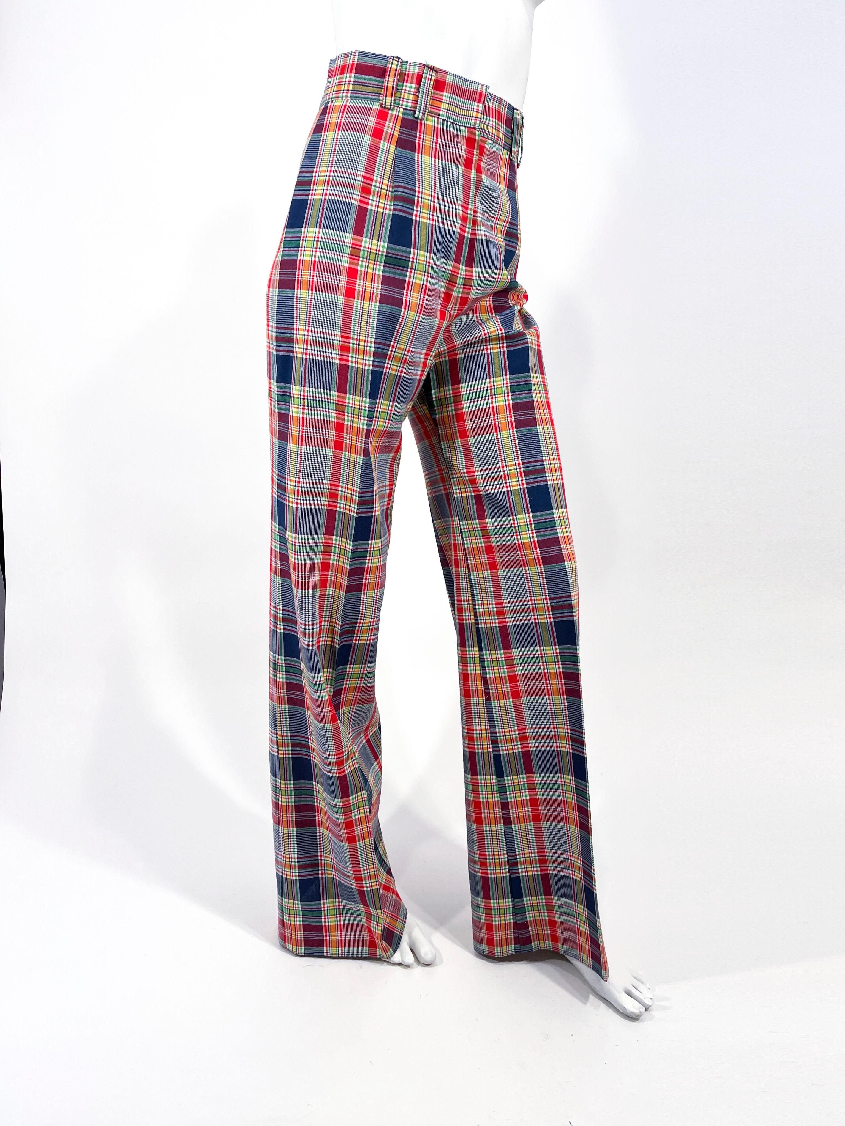 1970s Plaid Multi-colored Plaid Wide Legged Pants. The plaid features navy, yellow, green, and white. The high waist on these pants have matching belt loops. They are unlined and have a permanent pressed pleats to compliment the wide legs.