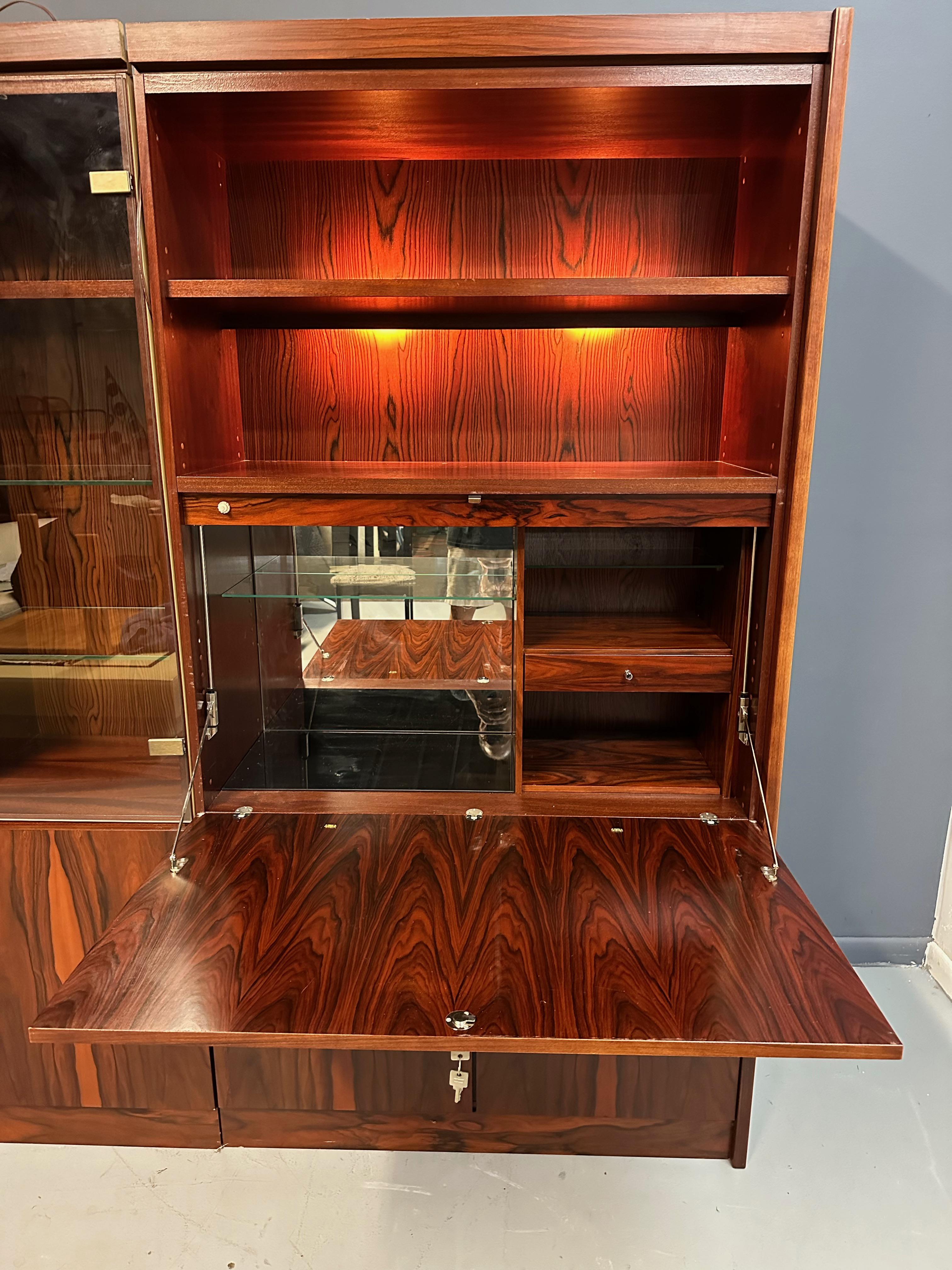 1970s Planum Rosewood and Mahogany Lighted Wall Unit with Desk Mid Century In Good Condition In Philadelphia, PA