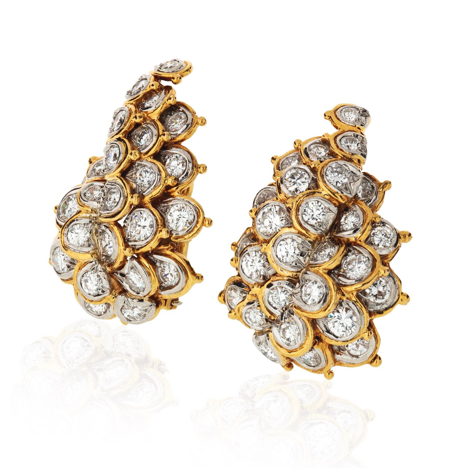 Yellow gold leaf motif style estate diamond earrings crafted in Platinum and 18K yellow gold. Encrusted with about 5.00 carats of round brilliant cuts.

These earrings have a clip back closure and are slightly over 1 inch in length.