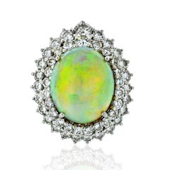 1970s Platinum Large Fire Opal and Diamond Ring