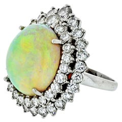 1970s Platinum Large Fire Opal and Diamond Ring