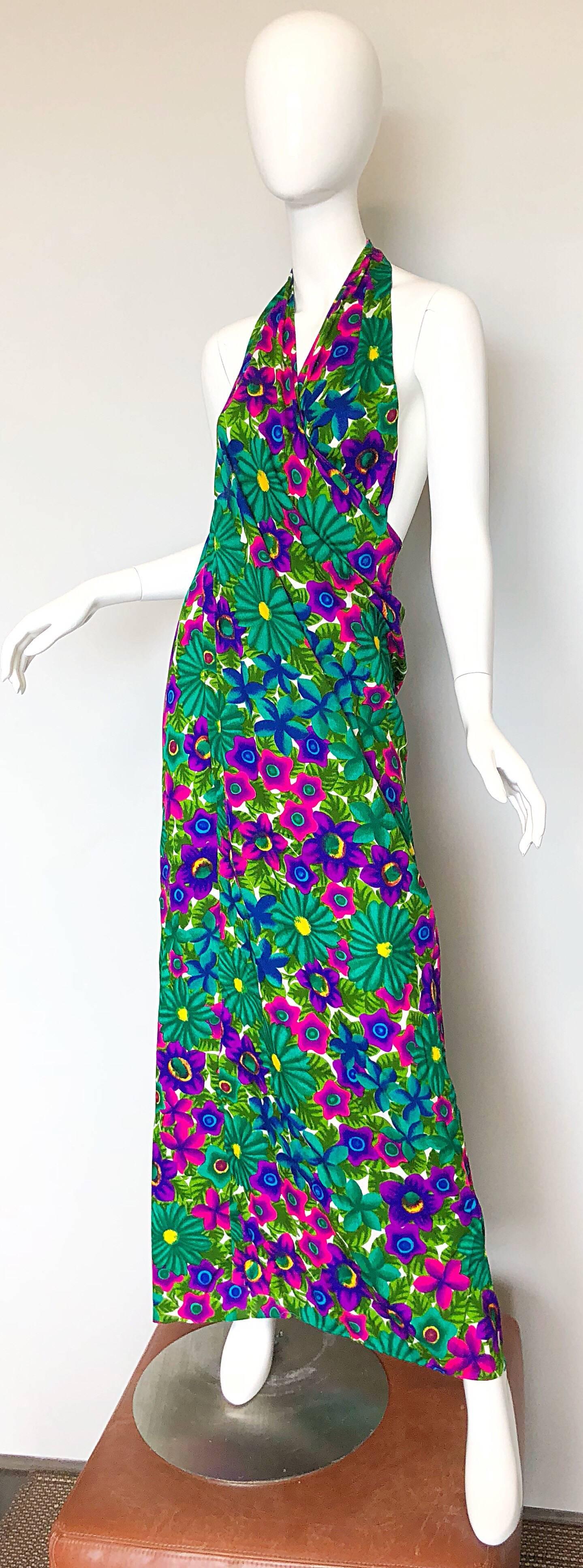 Chic, yet versatile POMARE of HAWAII brightly colored floral wrap halter maxi dress! Soft cotton blend, with bright colors in purple, pink, blue, fuchsia, green and yellow. Criss crosses around the neck and ties at top back neck. Can also be used as