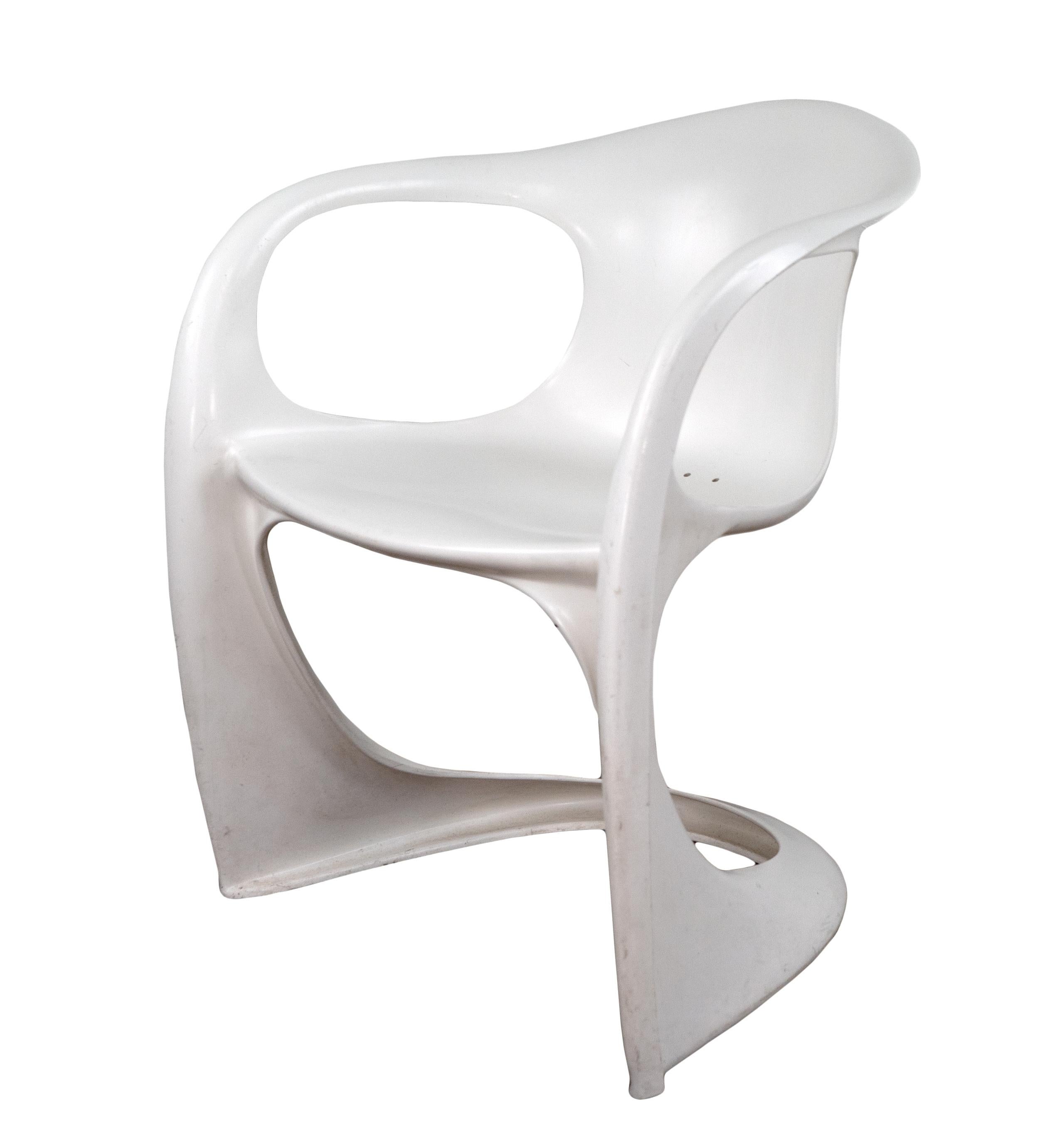 A molded sculptural soft white colored Casalino chair made of automobile strength plastic. A great 1970s design from the POP art period by Alexander Begge and sometimes referred to as the Begge chair.