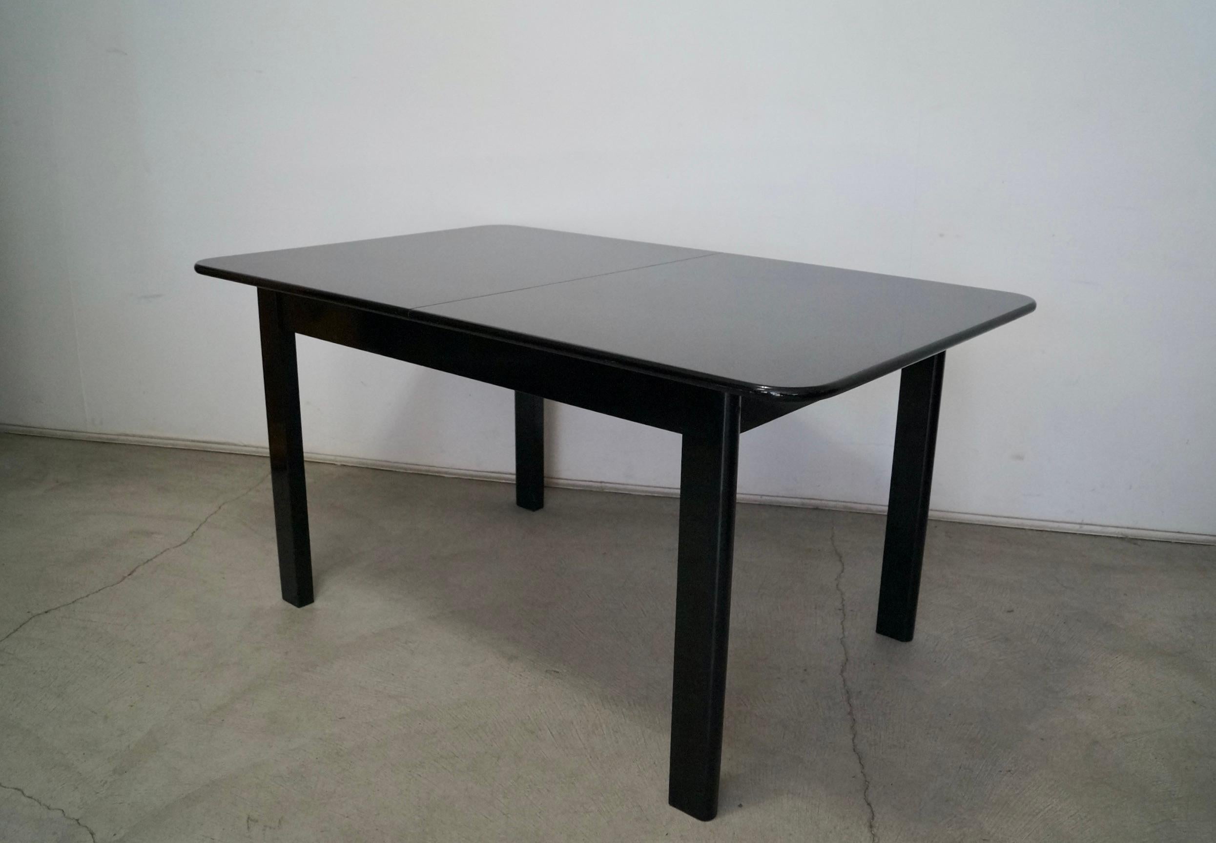 1970's Postmodern Hollywood Regency Italian Black Lacquer Dining Table In Good Condition For Sale In Burbank, CA