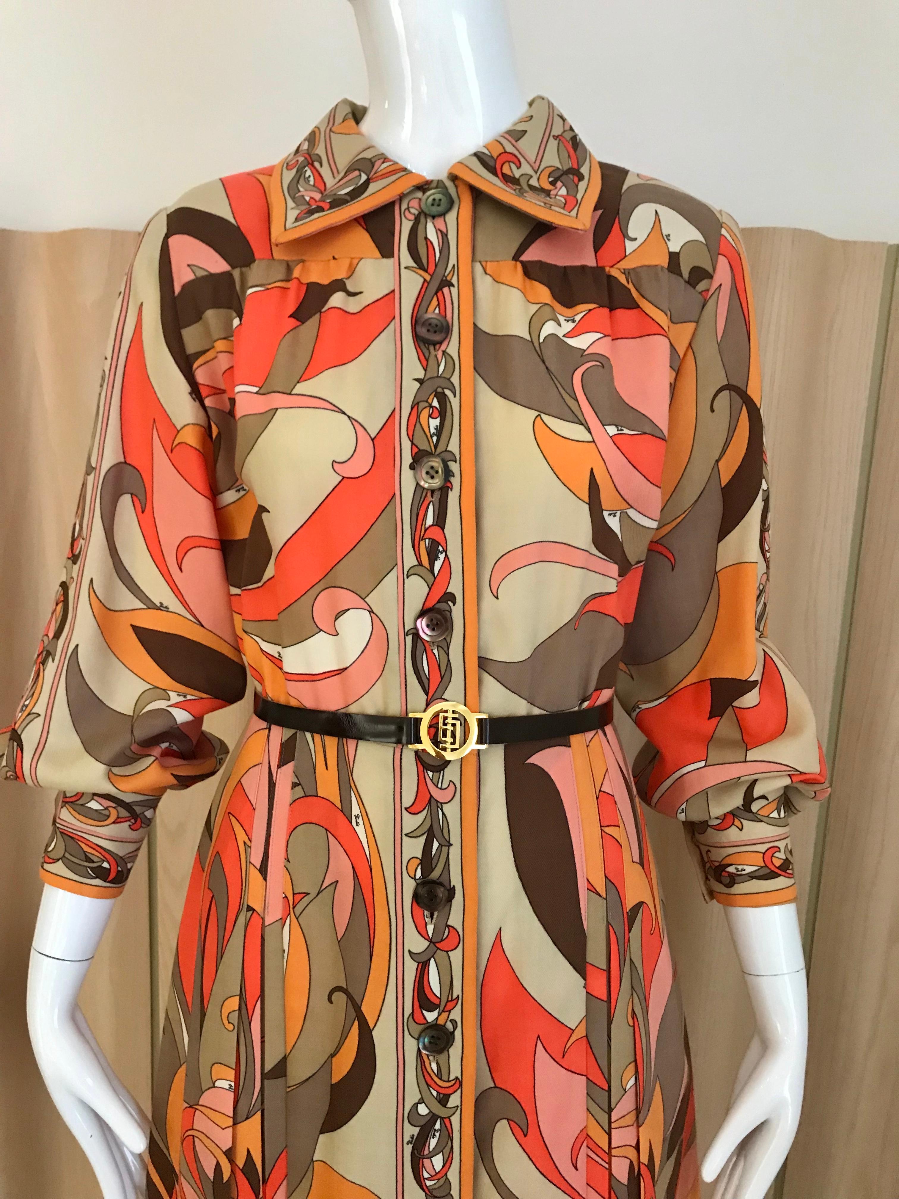 Vintage 1970s Pucci light wool in multi color print in orange, brown, creme and pink.
Dress comes with original belt. Dress is not lined however it is not itchy.
Size: Medium/ US 6

**** There are some minor distressed on the fabric near the label
