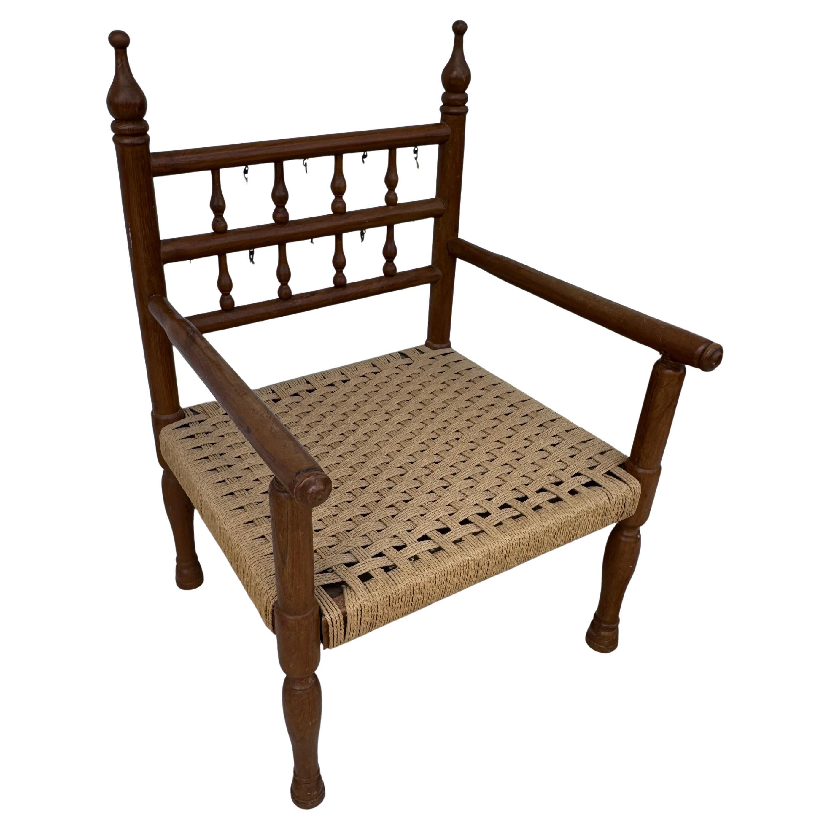 1970's Punjabi Wedding Chair in Teak with Rush Bottom Seat and Brass Bells For Sale