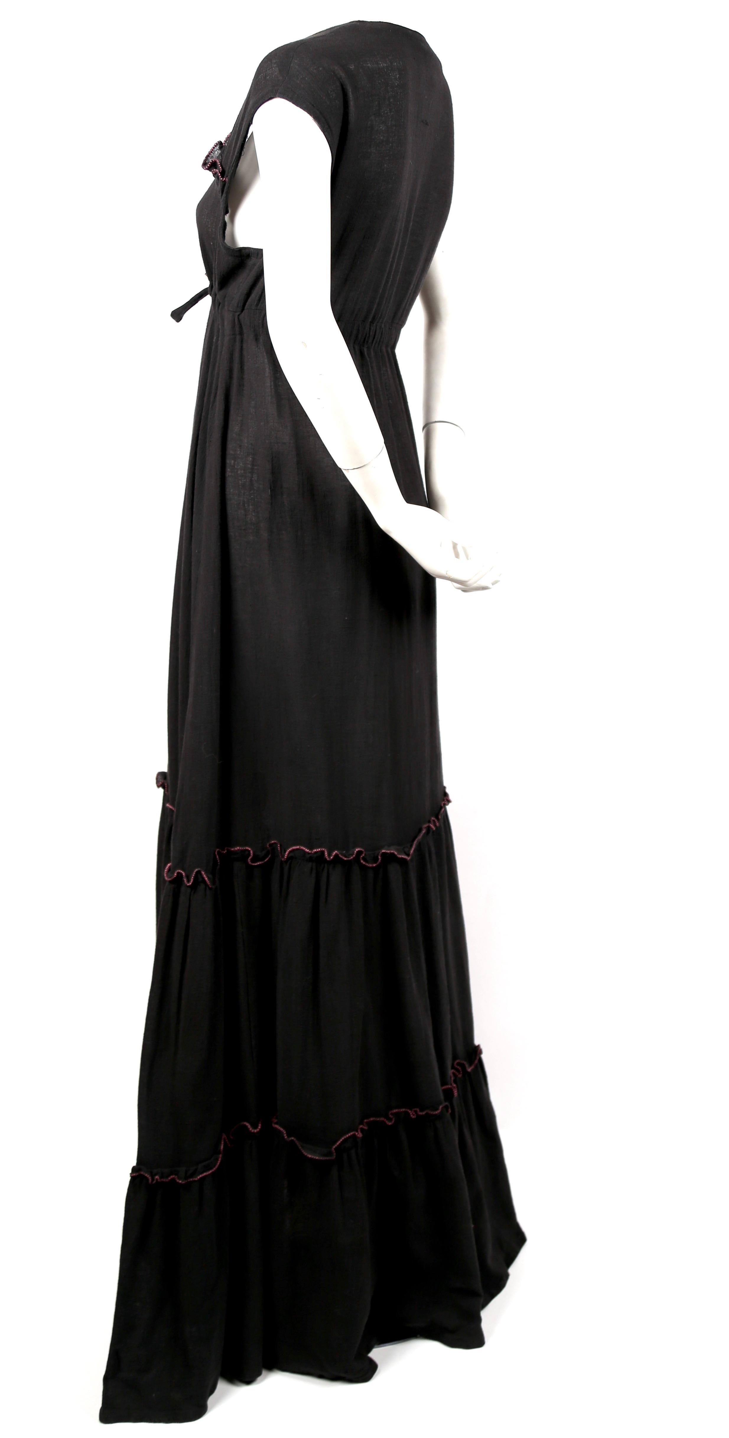 Soft-black, lightweight, cotton gauze maxi dress with pink stitching made by Radley dating to the 1970's. UK size 12. Dress was photographed on a size 2 mannequin and was not clipped. Adjustable empire waist drawstring closure. Approximate length