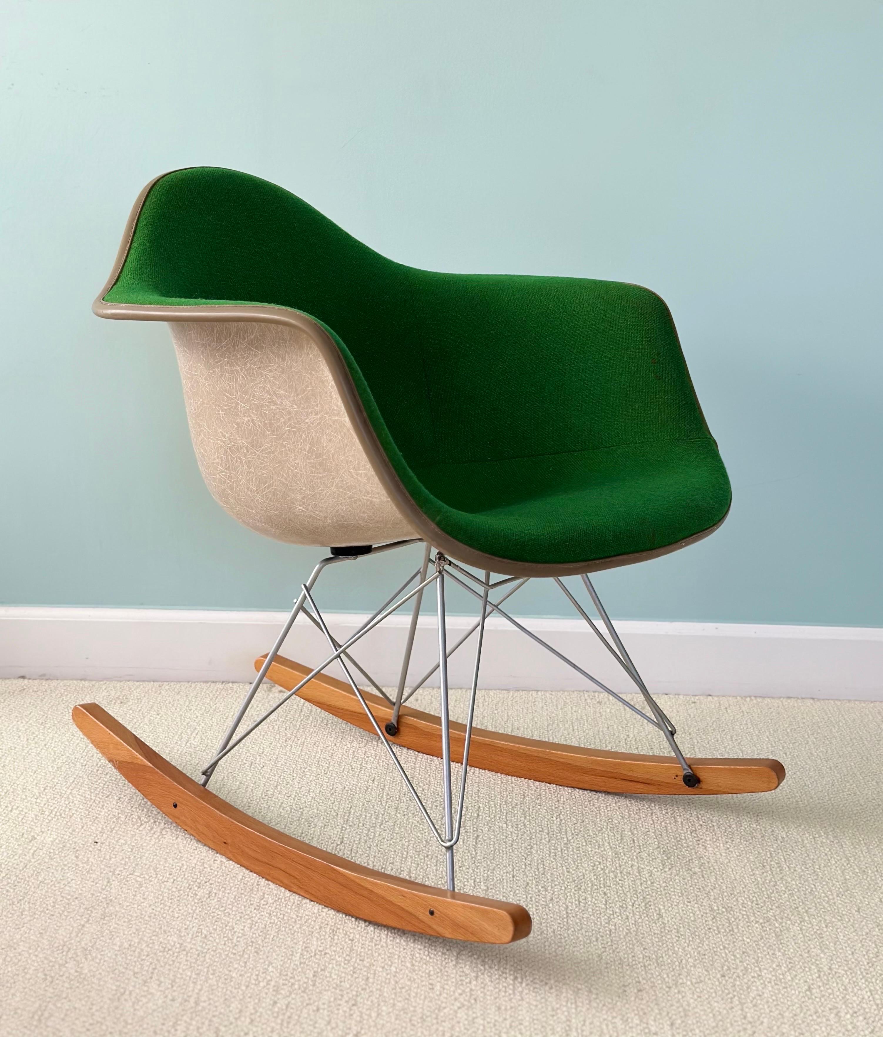 We are very pleased to offer a vintage rocking chair by Herman Miller, circa the 1970s.  The RAR Rocking Chair crafted by the iconic design duo, Charles and Ray Eames, was introduced in the 1950s and further became a symbol of Mid-century modern