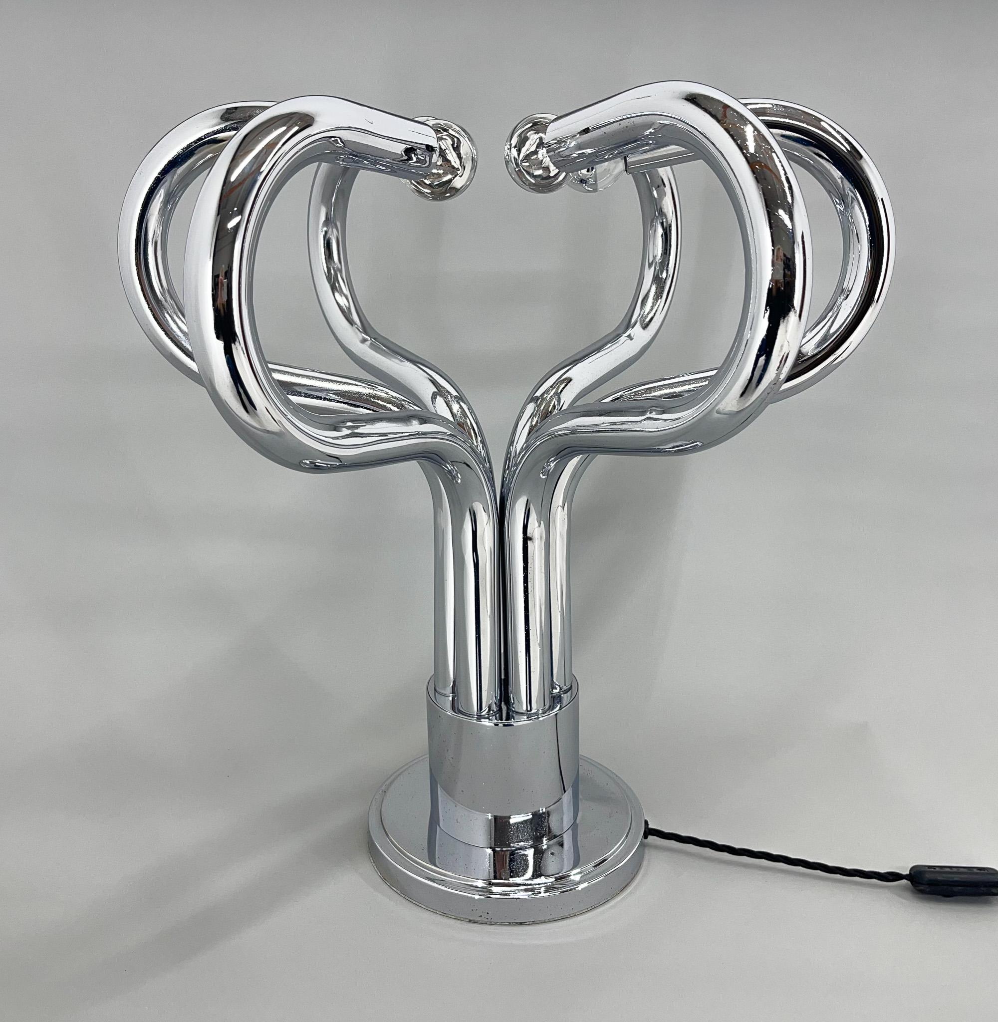 Unique chrome vintage table lamp by Stilux Milano. Made in Italy in the 1970's. The lamp is all chrome, professionally restored, newly rewired. The chrome still shows signs of time wear, but this only adds to the lamp's unique character. Bulbs: 6 x