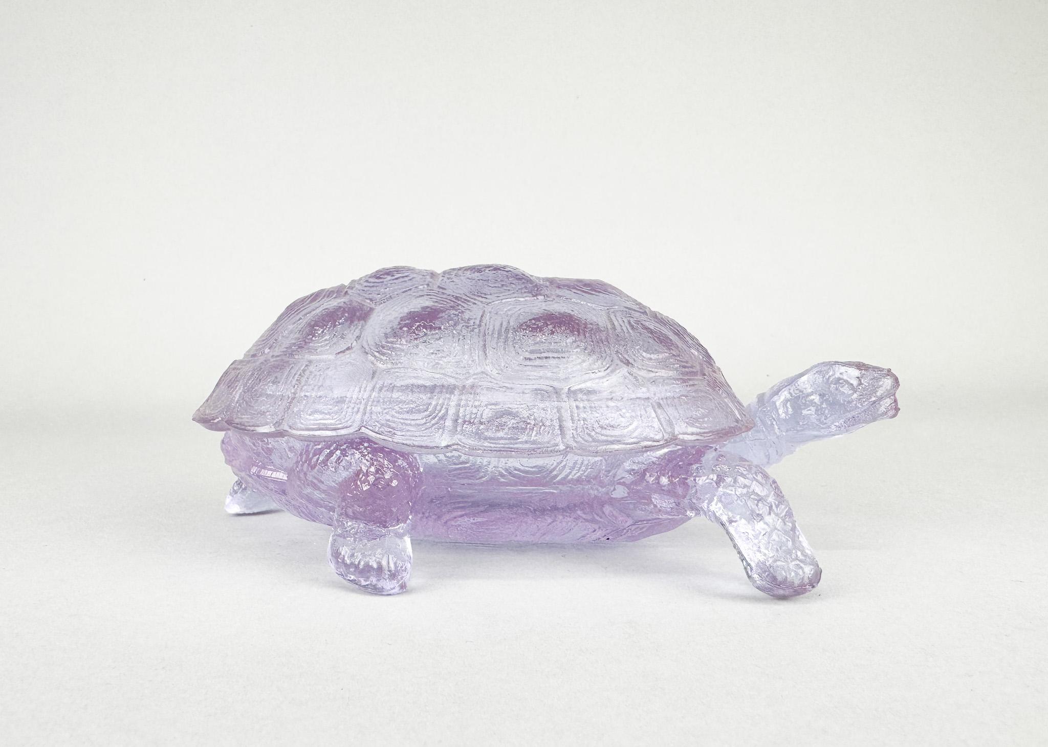 Glass jar in the shape of a tortoise made of alexandrite glass. Produced by Desna Glassworks in former Czechoslovakia in the 1970's