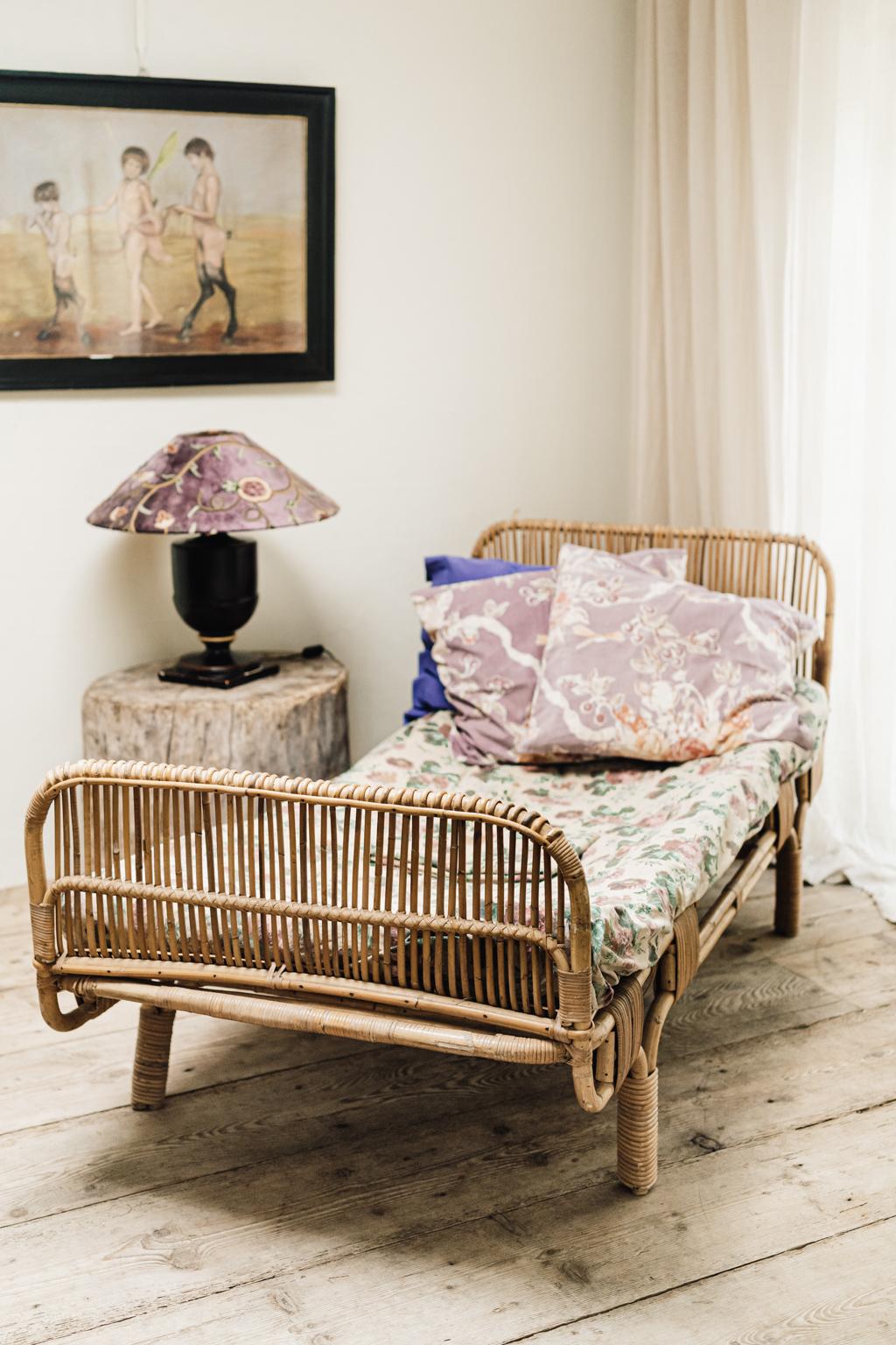 Great patina on this vintage rattan daybed.
