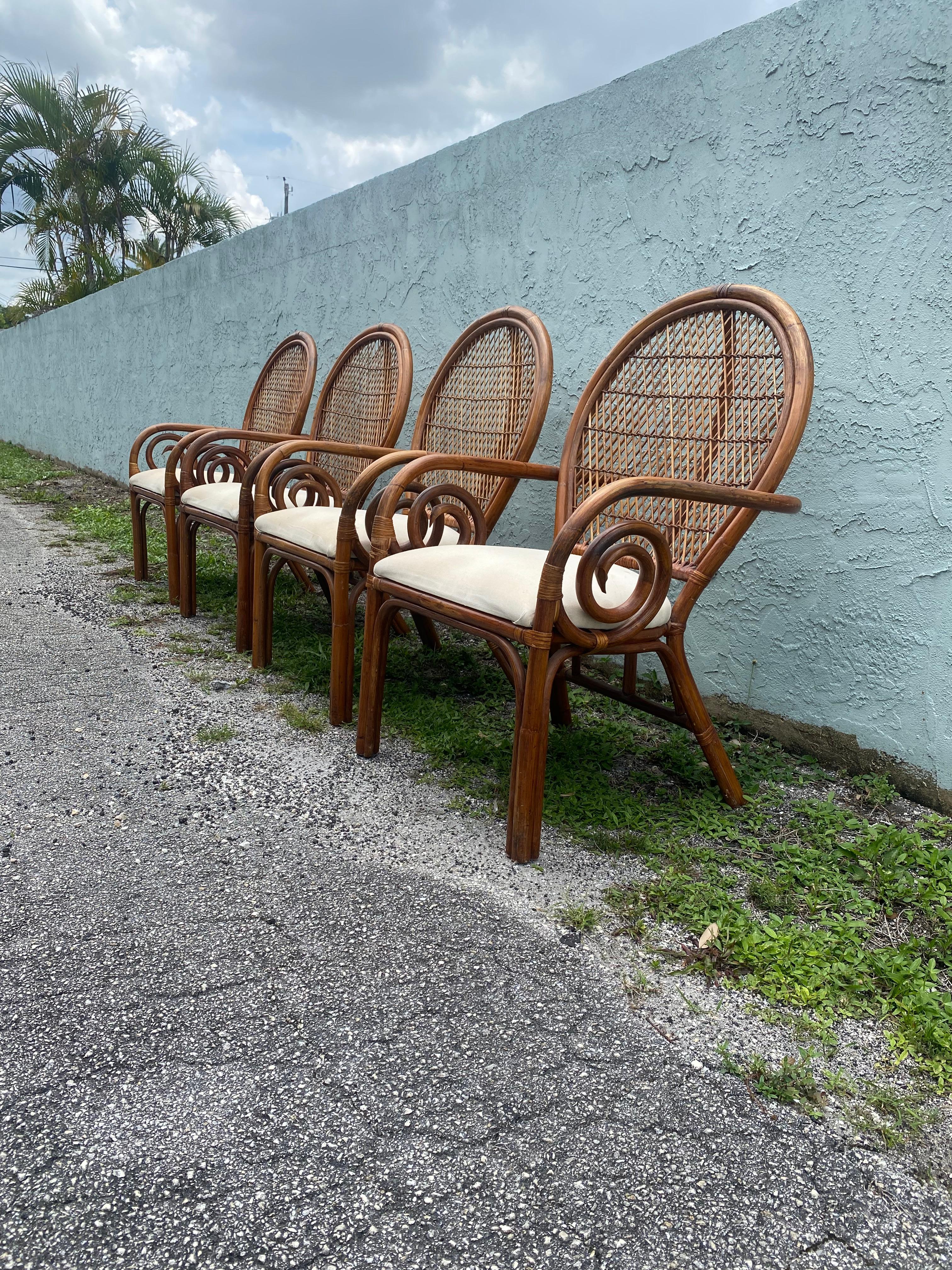 American 1970s Rattan Peacock Scroll Arm Sculptural Dining Side Chairs For Sale