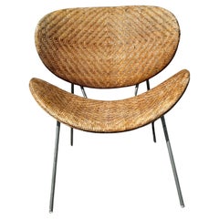 Sedia in rattan Pierre Paulin arancione stile fetta degli anni '70