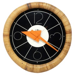 Reloj de pared de ratán de los años 70 de Arthur Umanoff para Howard Miller