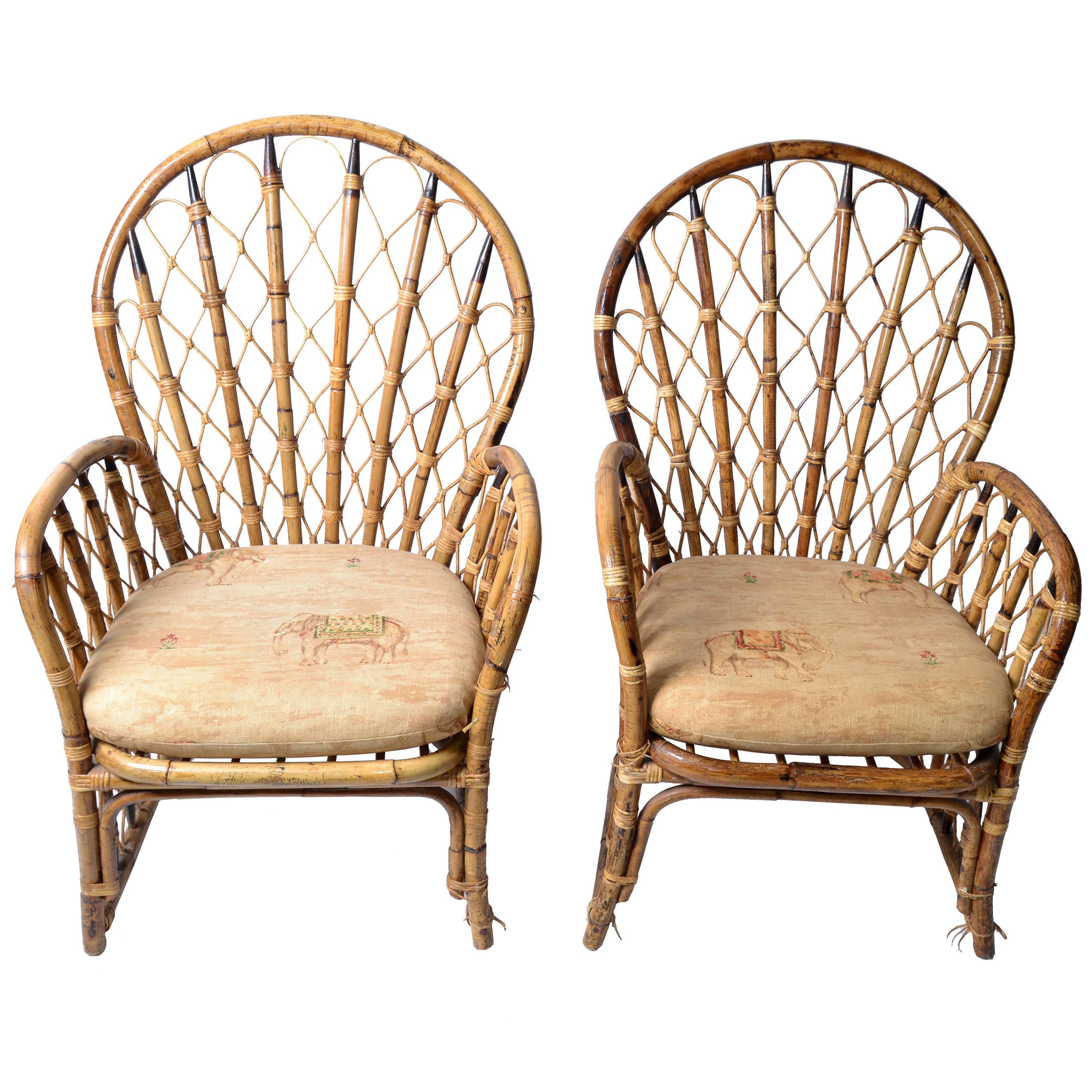 Set of two vintage rattan, wicker and bamboo dining chairs for your Pavilion.
Chinese inspired bamboo patterns.
Handcrafted and made in the Philippines.
They have each a seat cushion.
Labelled on one chair.
Measures: Arm height 24.5