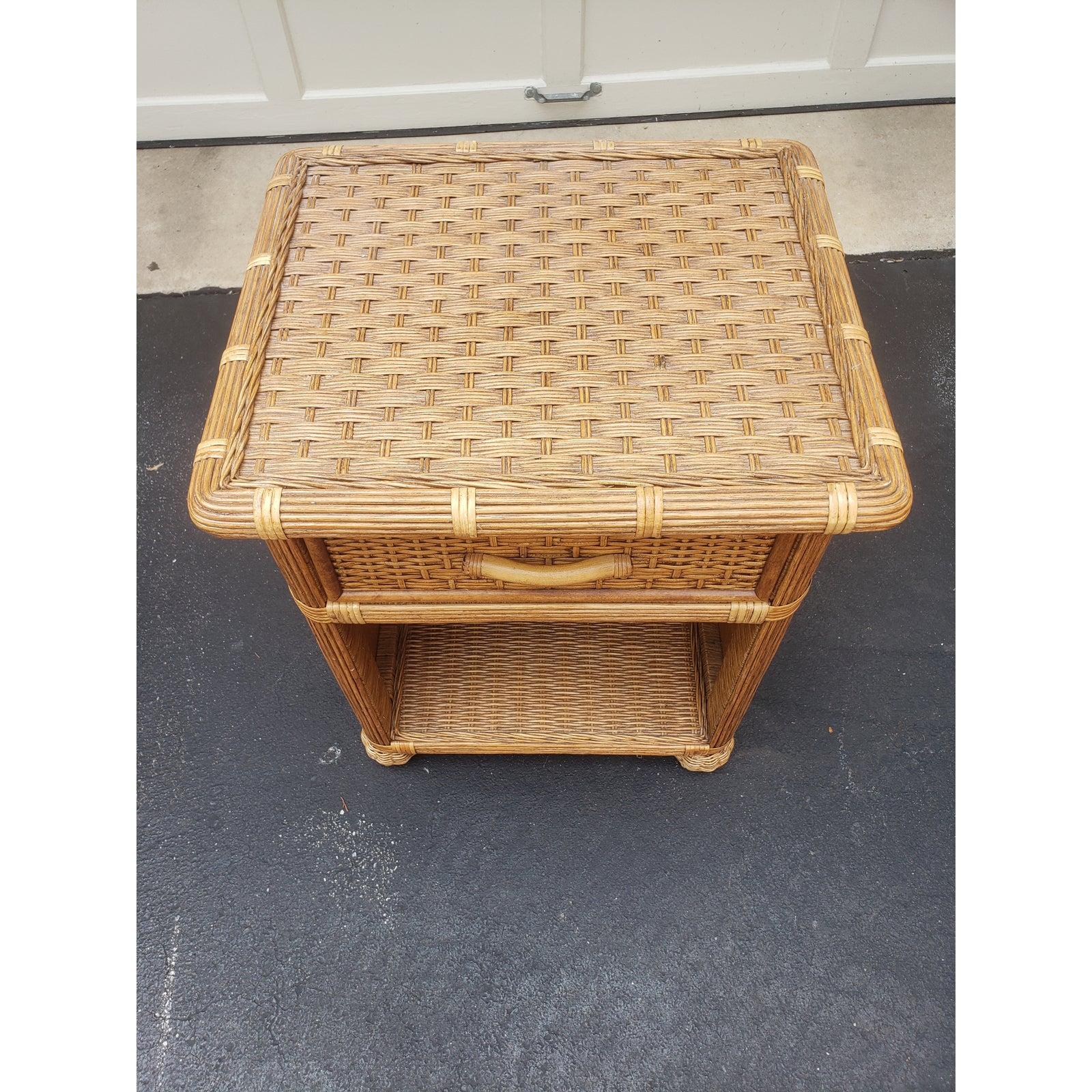 1970s Rattan wicker nightstand with drawer. Excellent condition. Drawer is working smoothly.
Measures 21