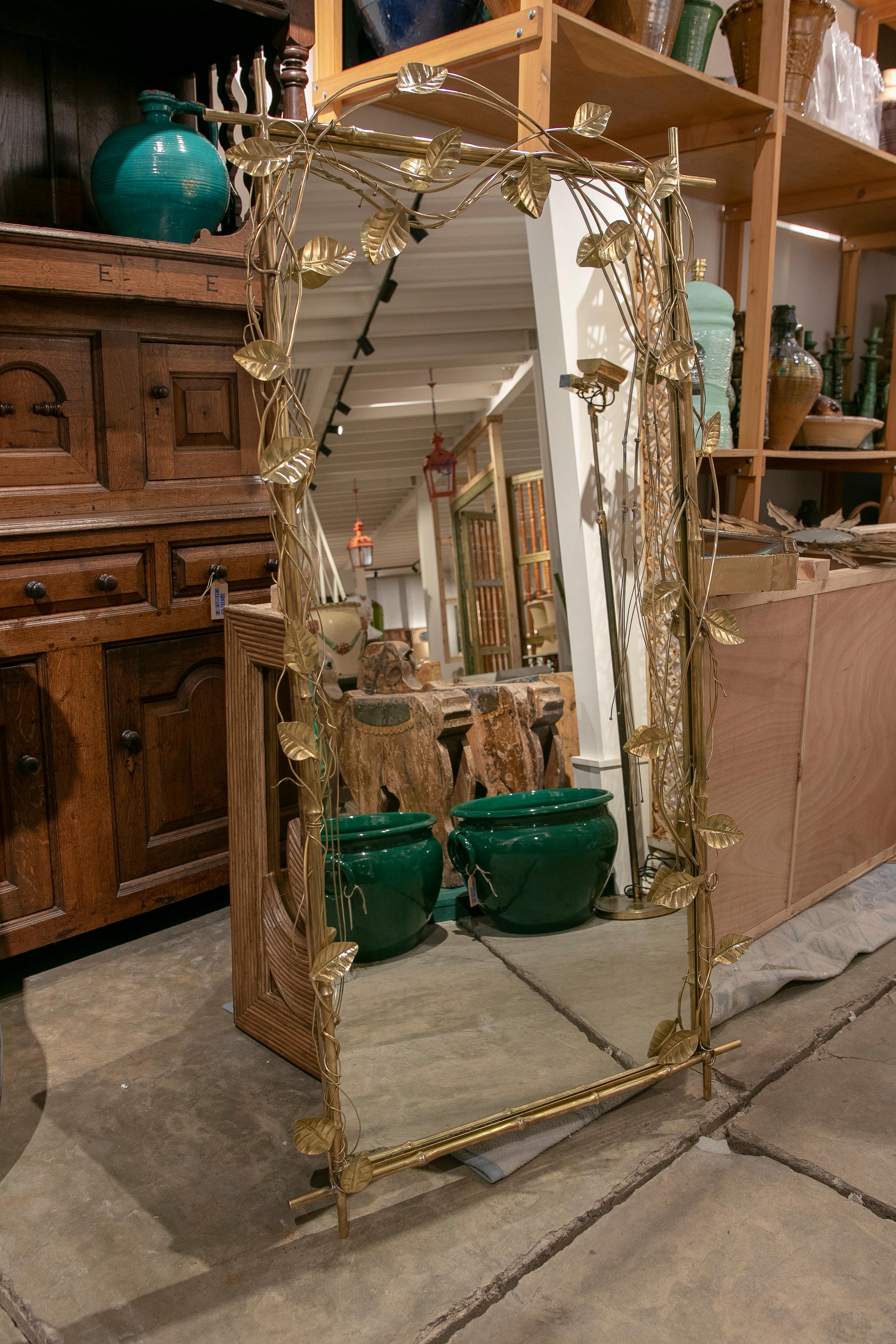 1970s rectangular wall mirror with leaves.