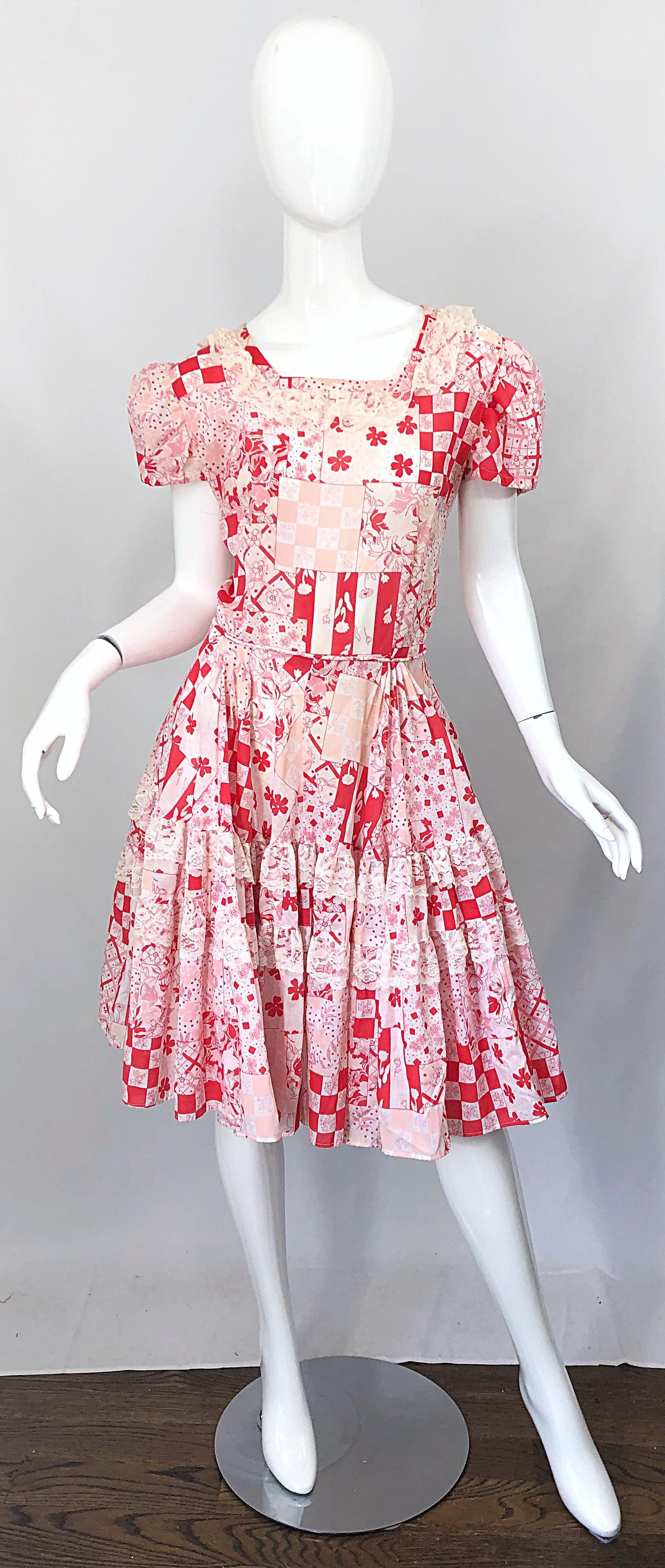 Chic 1970s novelty print red and white puff sleeve dress! Features a soft cotton fabric with ivory lace around the collar. Cute puff sleeves on a fitted bodice. Full forgiving and flattering skirt also features ivory lace hand-sewn throughout.