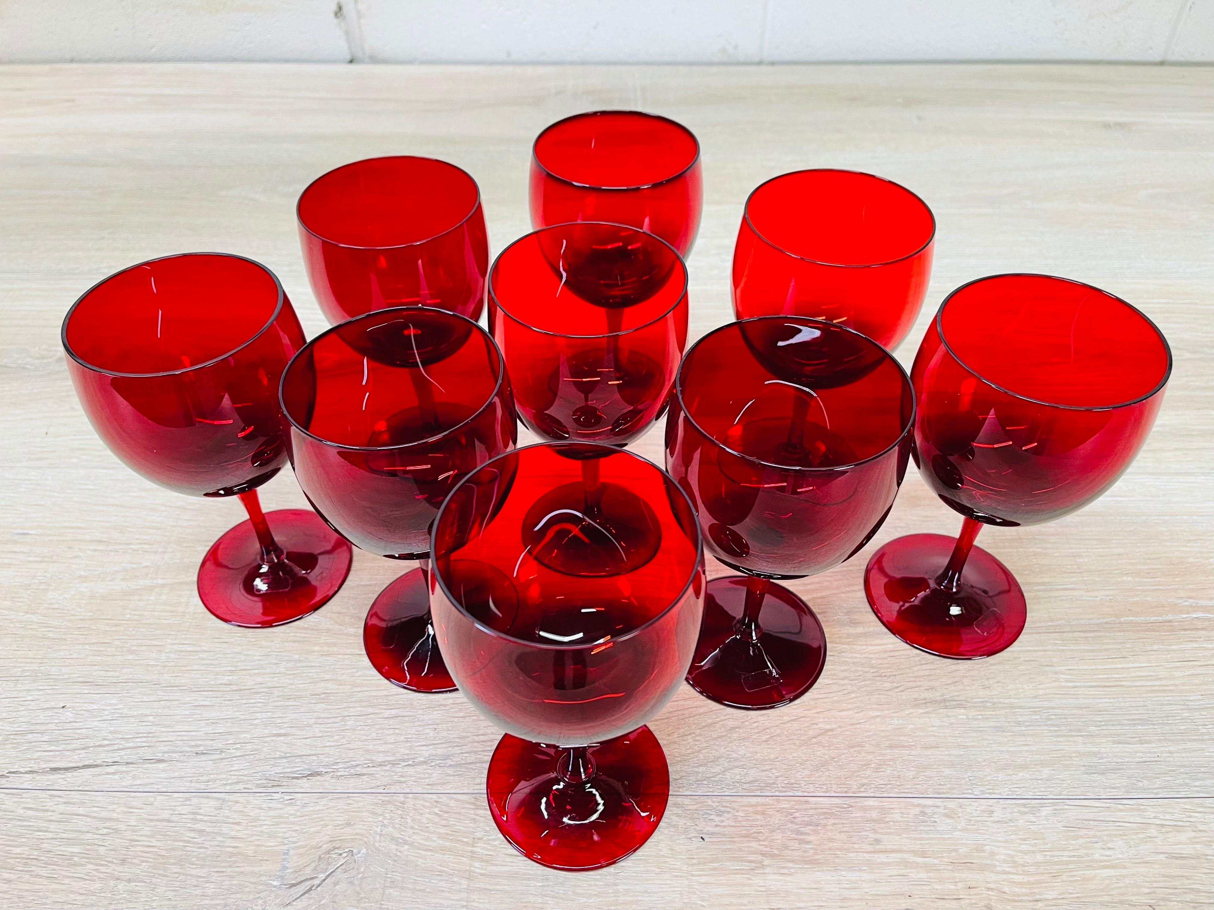 wine glasses with red stems