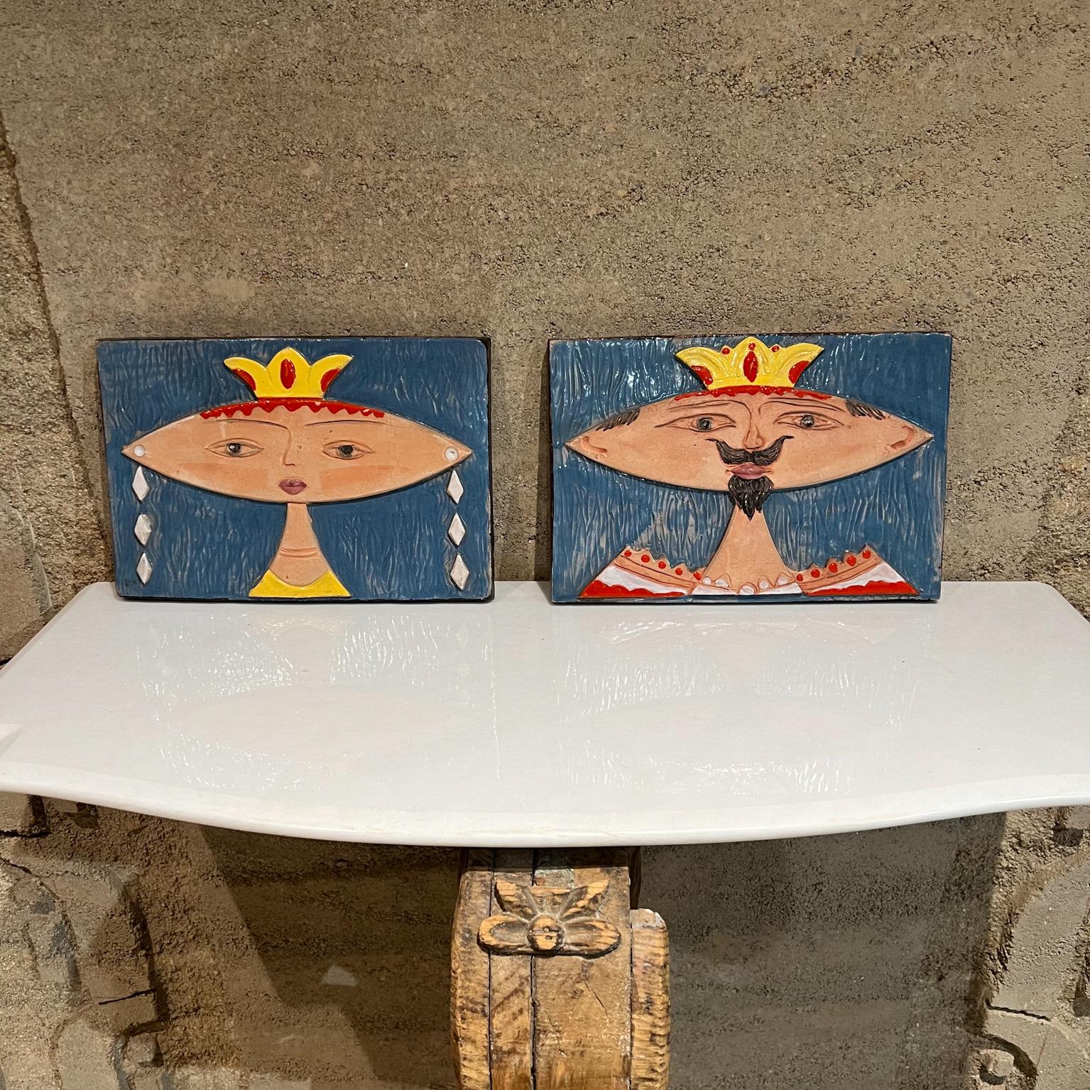 Italian Ceramic tile set of 2 His and Her hand painted 
1970s Regal His and Her Italian Wall Tiles Style of Giovanni De Simone ITALY
11.5 w x 8.25 tall x .5 thick
Stamped 17/105 A and B Italy
Original vintage condition preowned.
See images